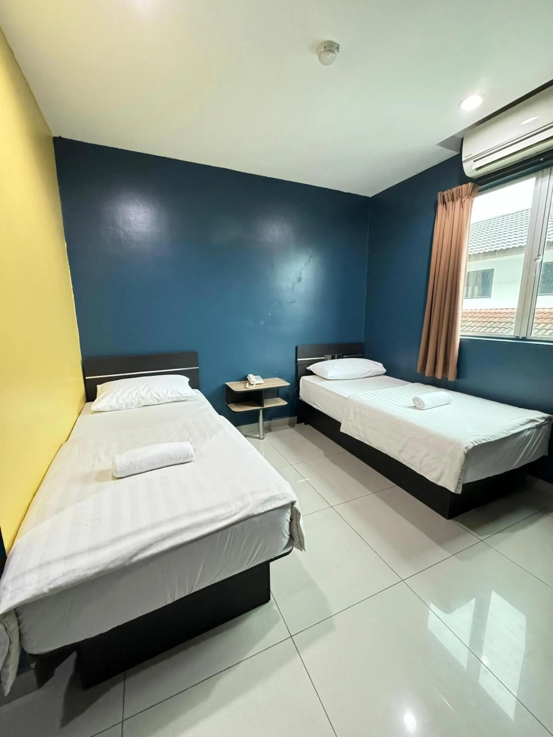 Bed in Hotel Pinji Ipoh