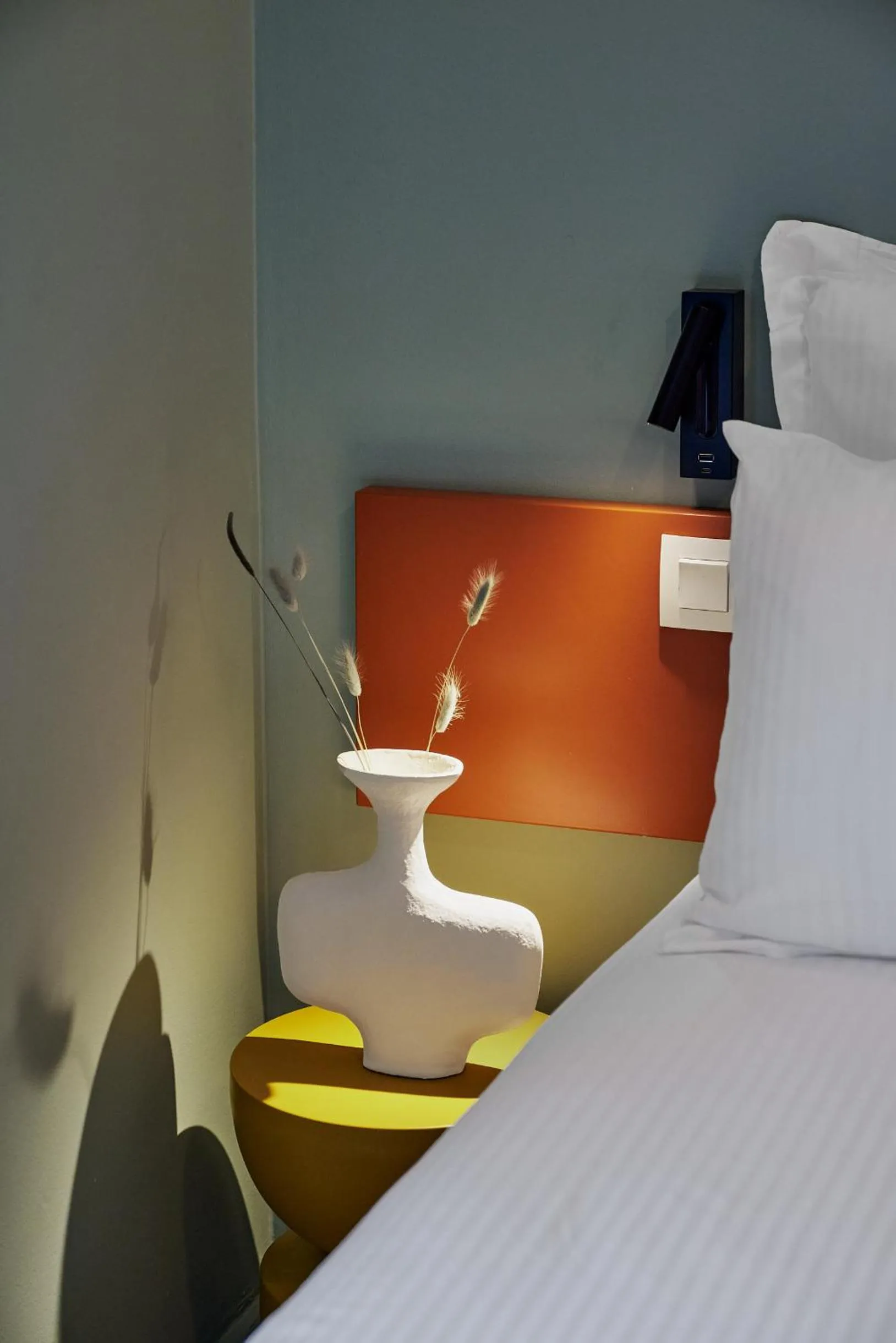 Bed in Hôtel Ligo by HappyCulture