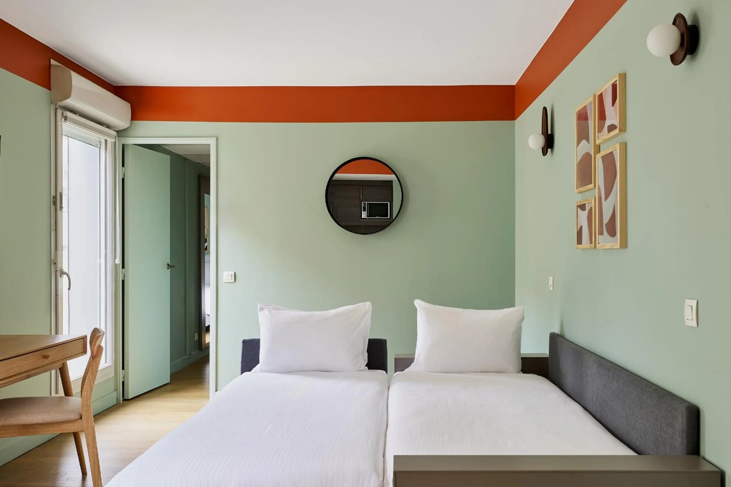 Bed in Hôtel Ligo by HappyCulture