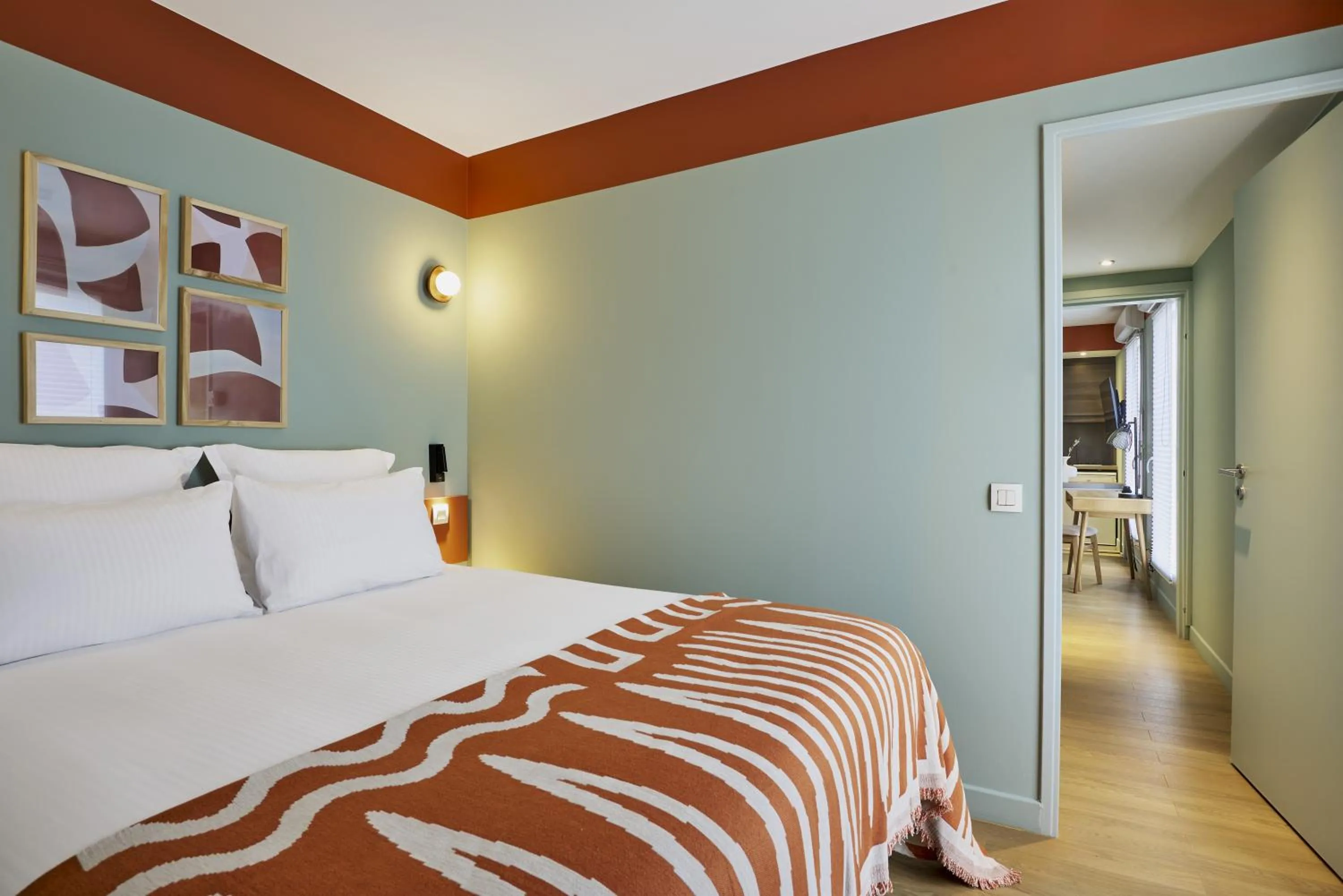 Bed in Hôtel Ligo by HappyCulture