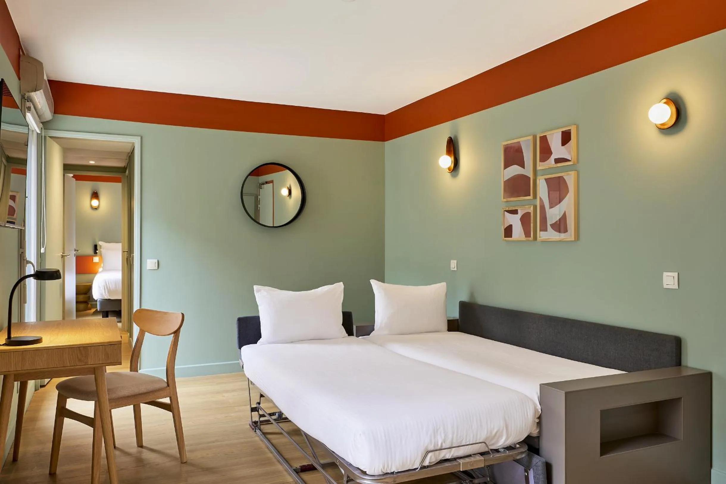 Bed in Hôtel Ligo by HappyCulture