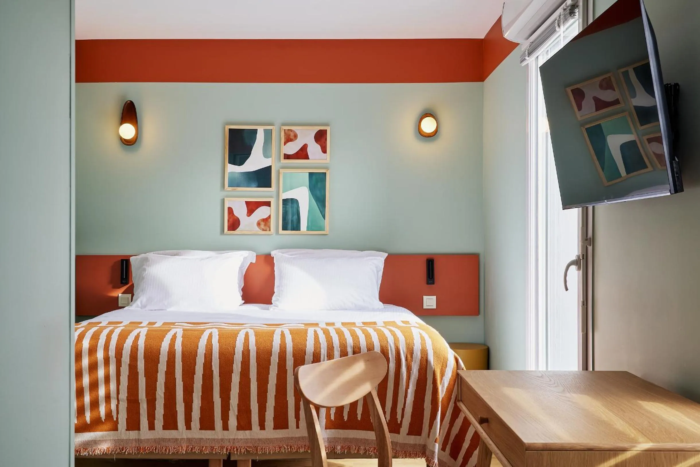 Bed in Hôtel Ligo by HappyCulture