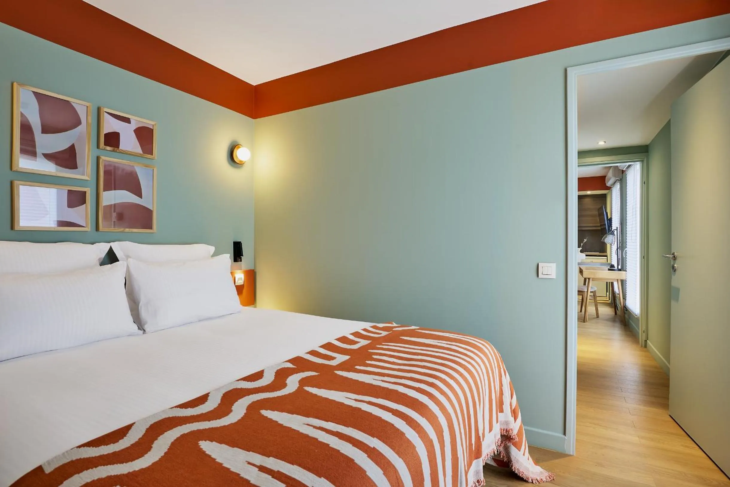 Bed in Hôtel Ligo by HappyCulture