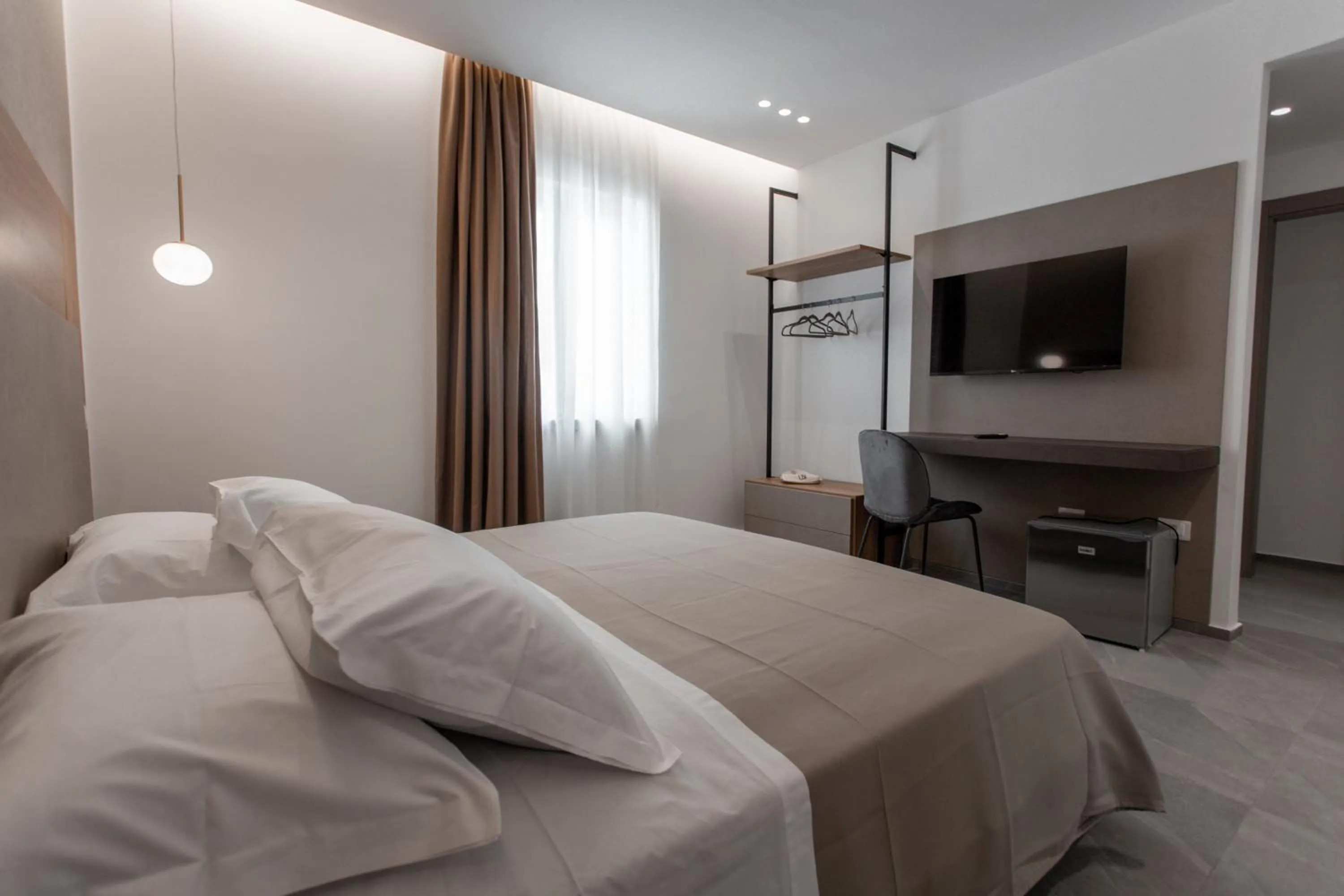 Bed in Alexander House Hotel