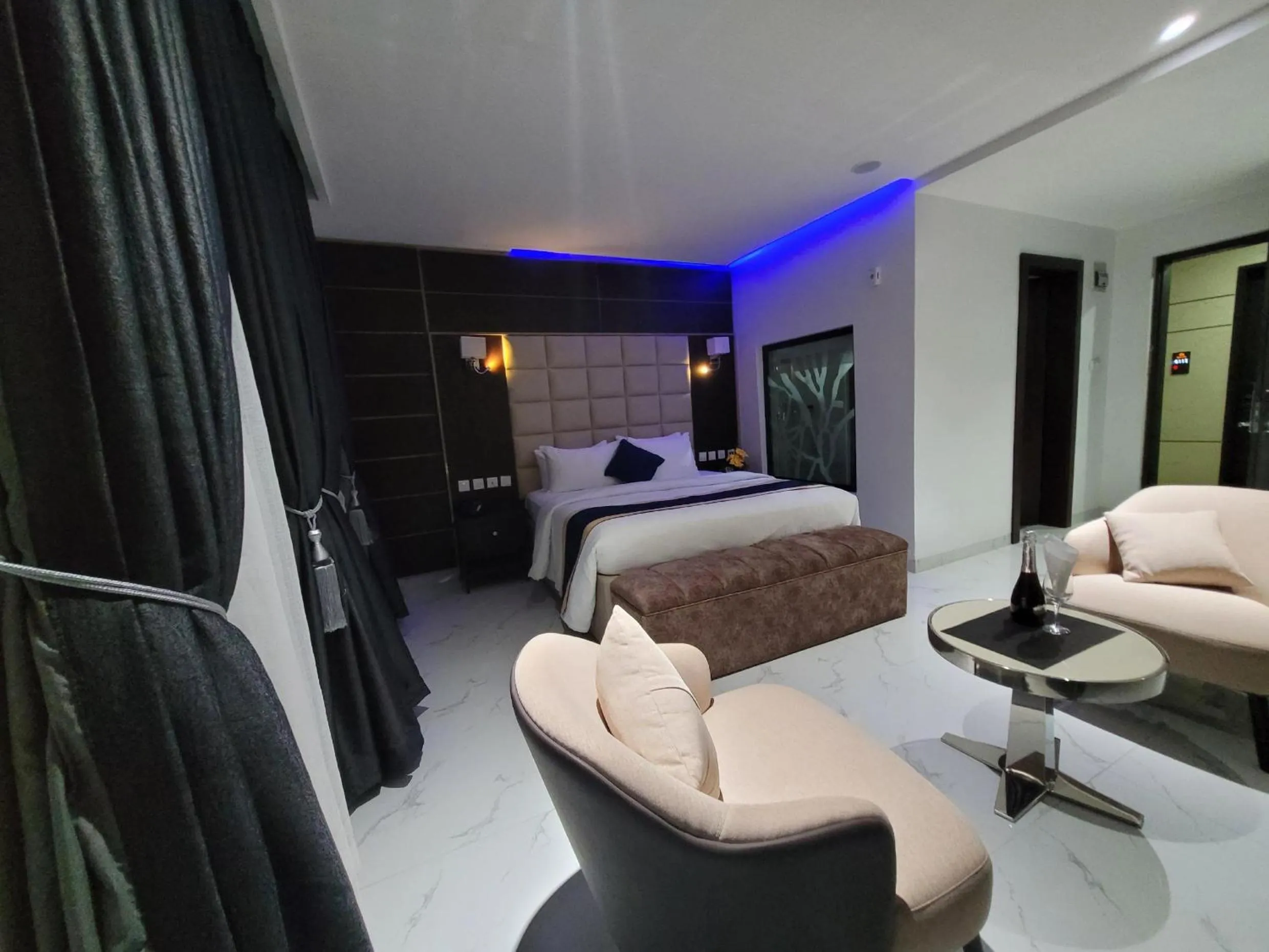 Bed in Carlton Swiss Luxury Residency