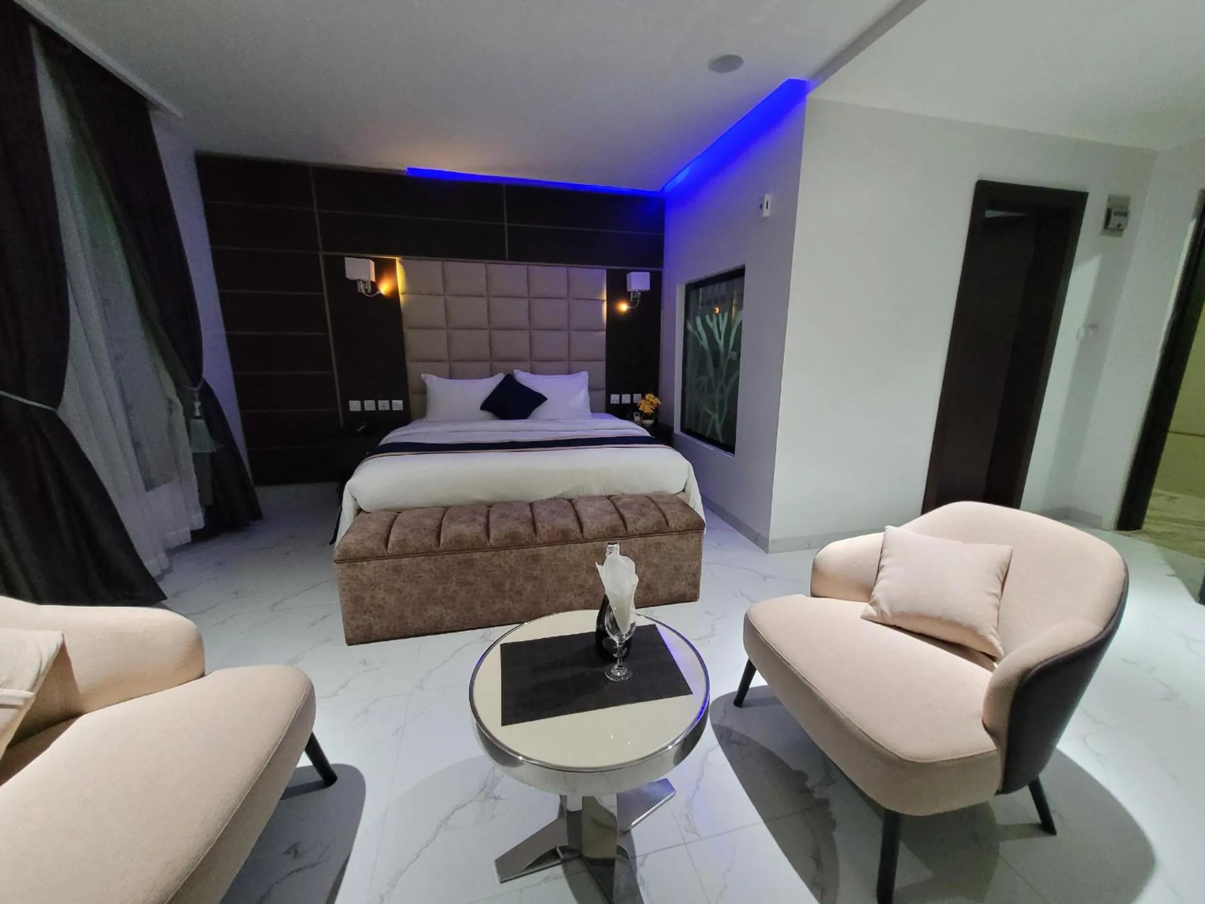 Bed in Carlton Swiss Luxury Residency