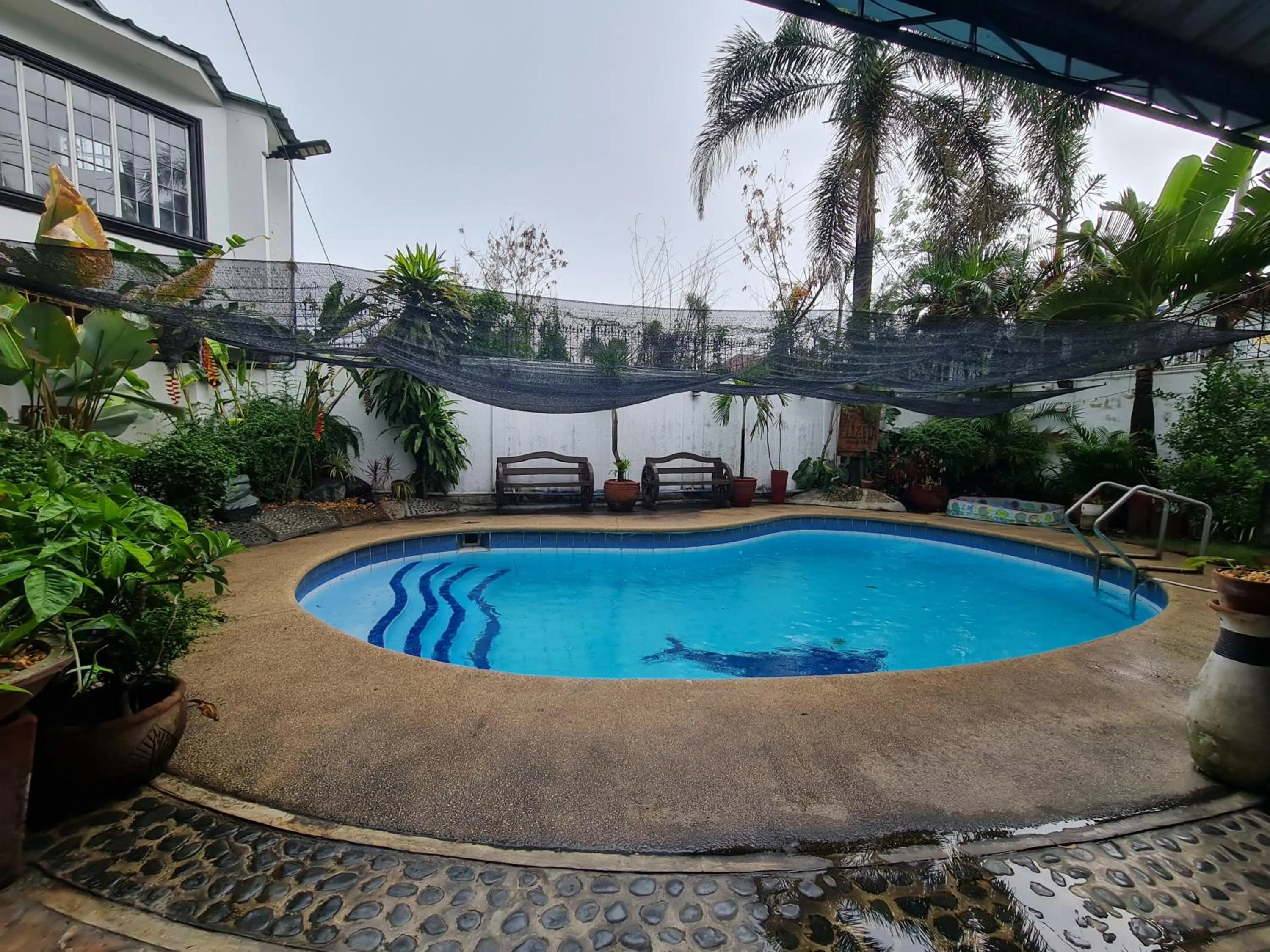Swimming pool in Casa Eliana Garden Villa by SMS Hospitality