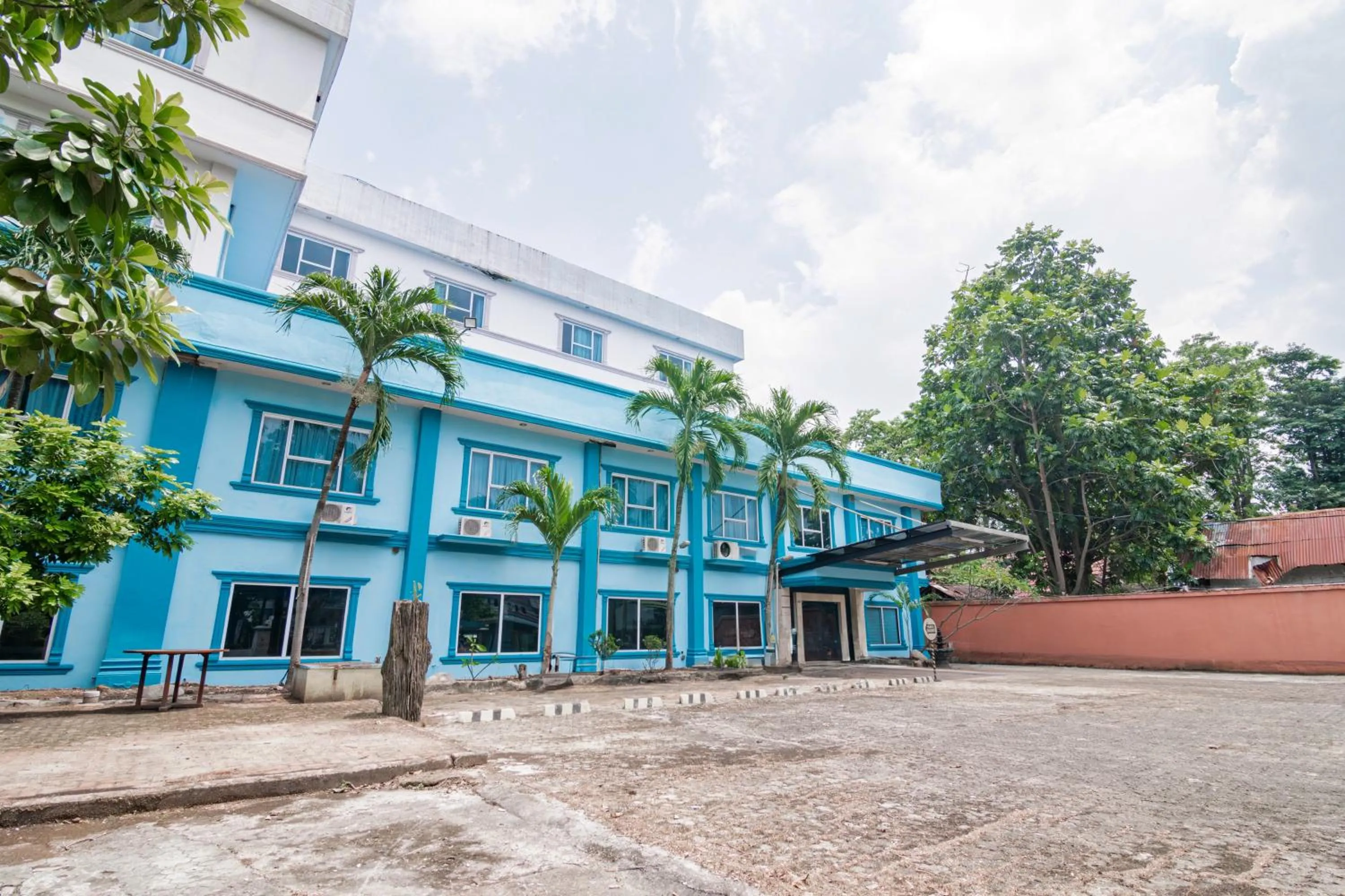 Facade/entrance in Collection O Senapelan Near Rsud Petala Bumi Formerly De Town Hotel