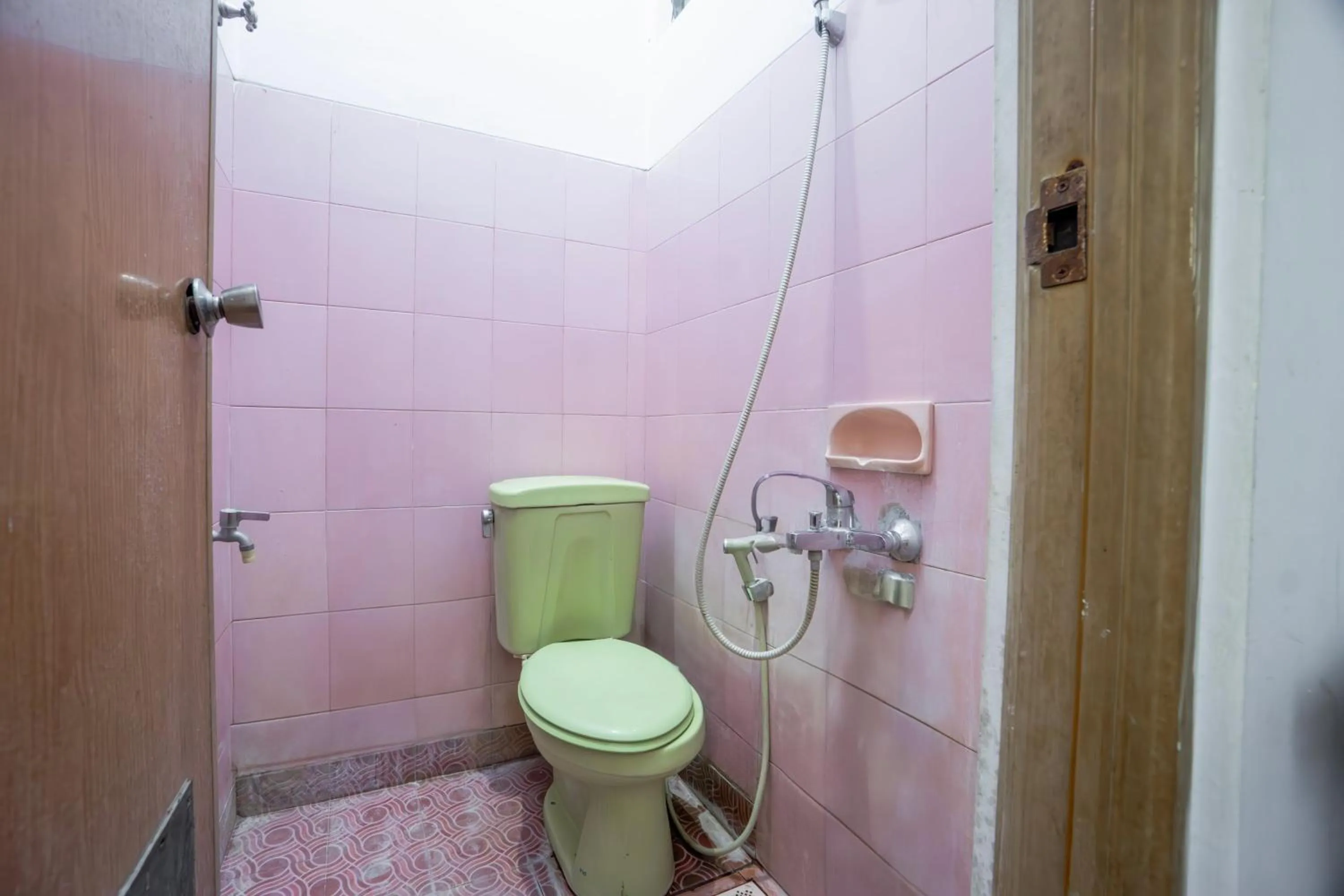 Bedroom in Hotel O Central Madiun Near Stasiun Kota Madiun