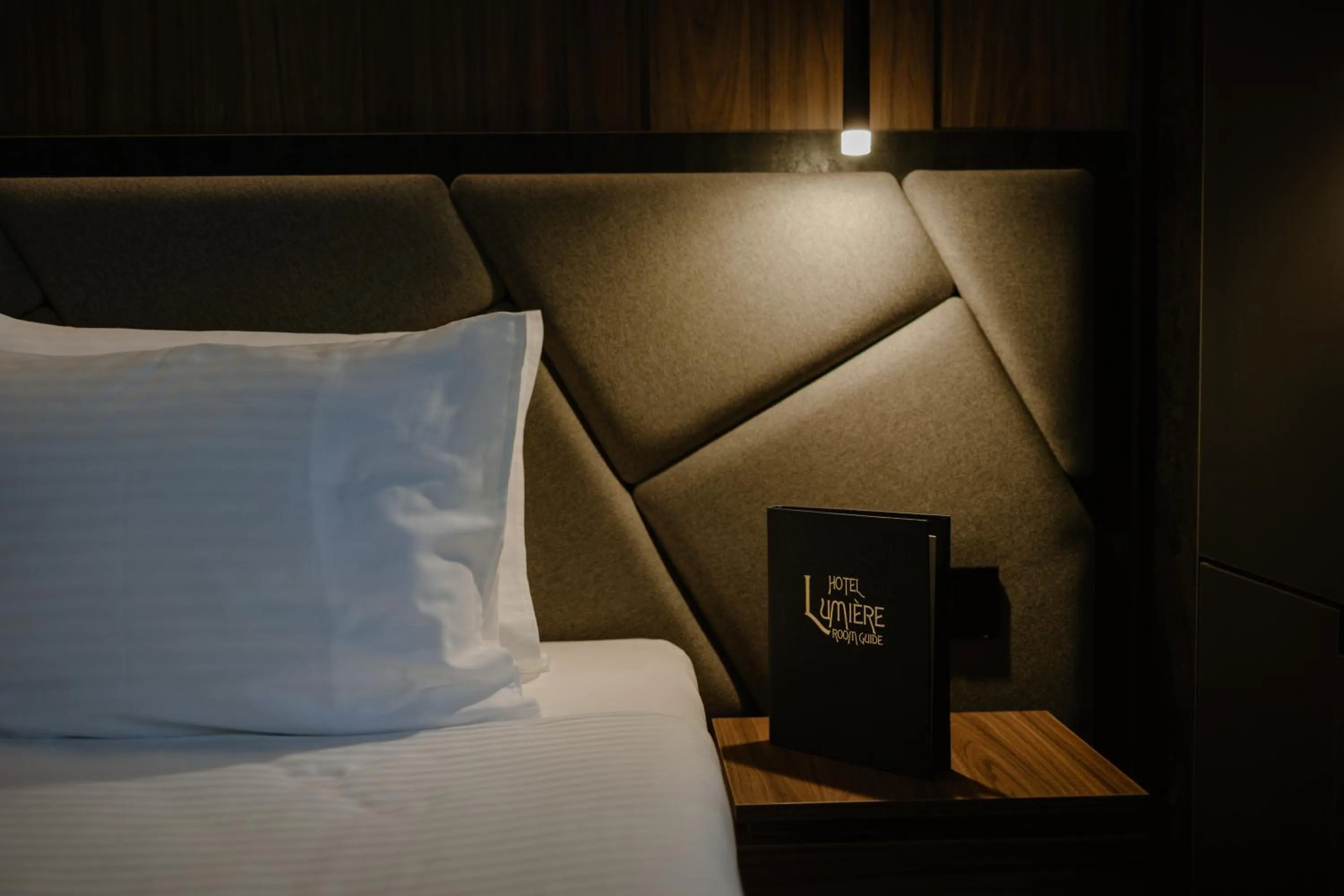 Bed in Lumière Hotel Pool & SPA