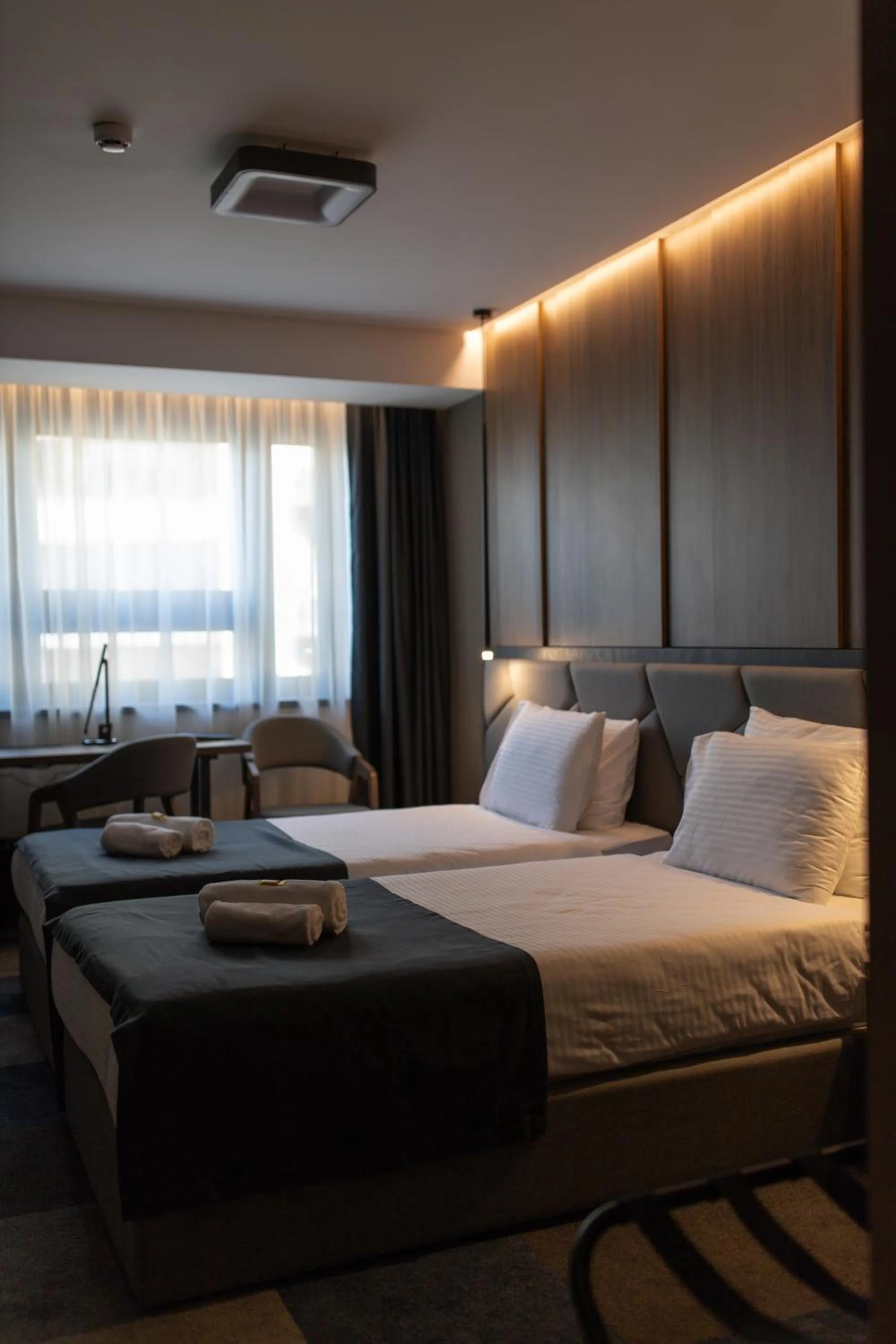 Bed in Lumière Hotel Pool & SPA