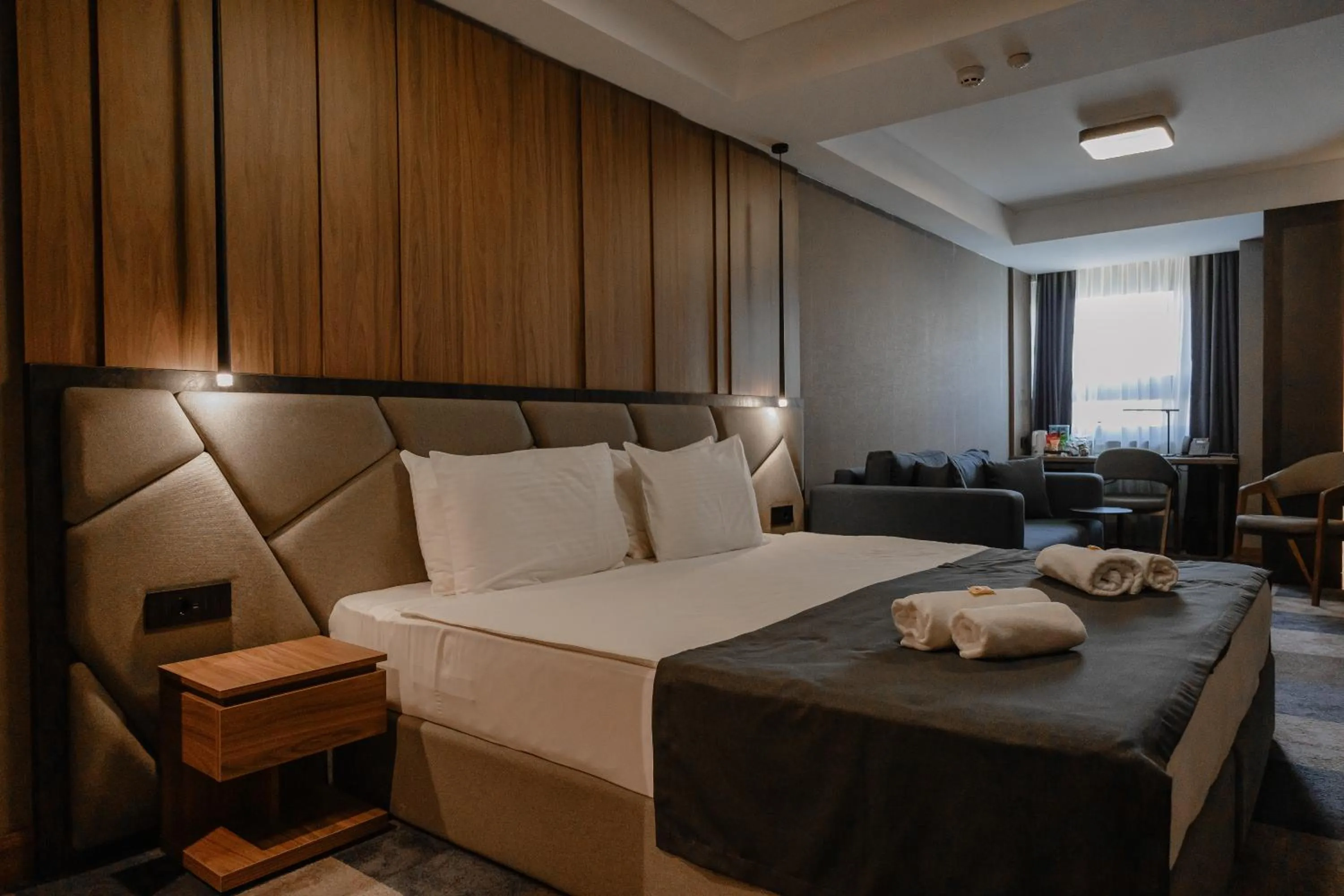 Bed in Lumière Hotel Pool & SPA