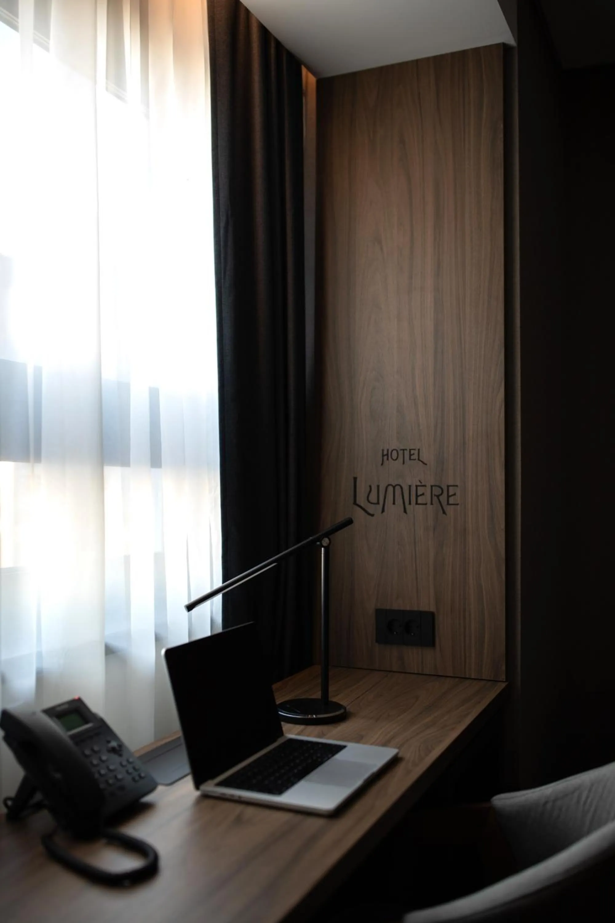 Text overlay in Lumière Hotel Pool & SPA