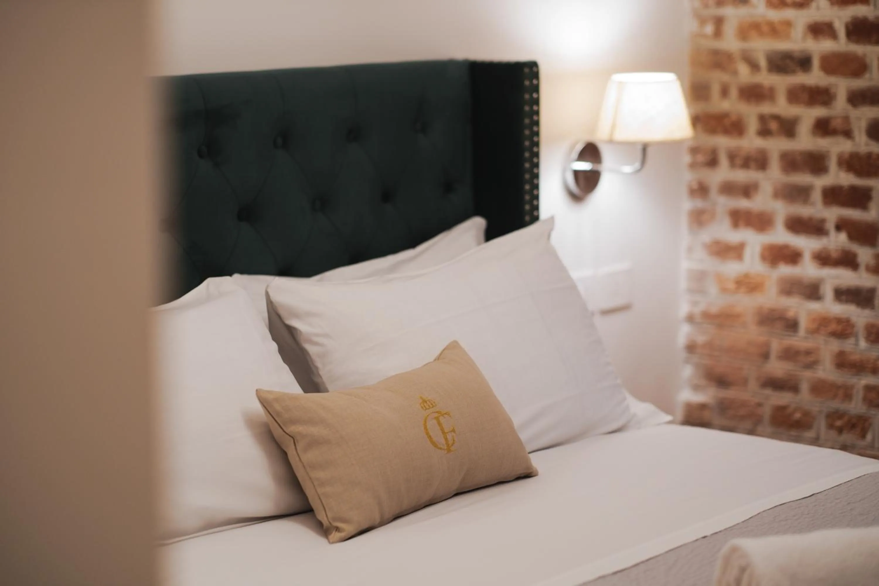 Bed in Carlo Felice Boutique Hotel