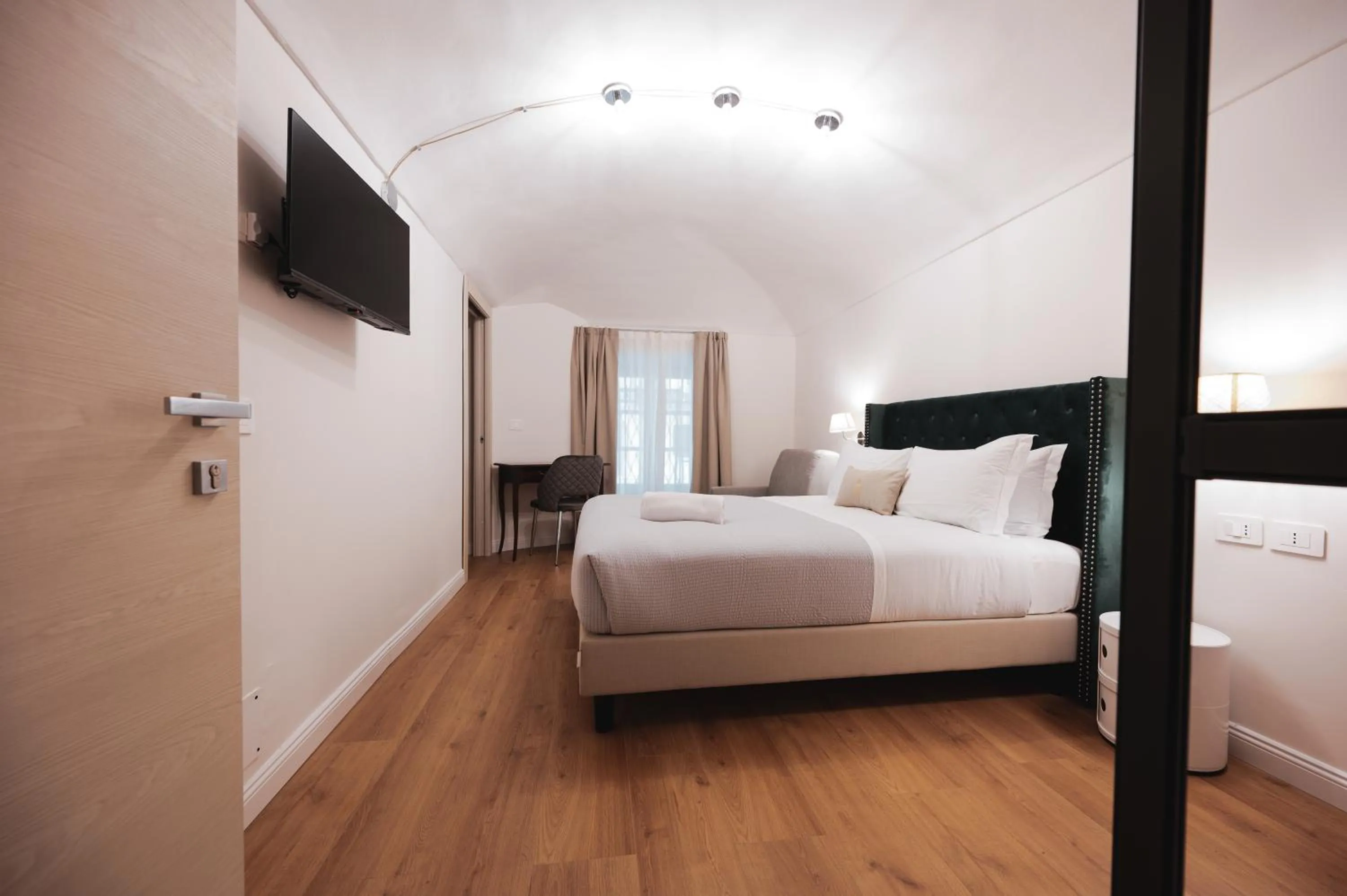 Photo of the whole room, Bed in Carlo Felice Boutique Hotel