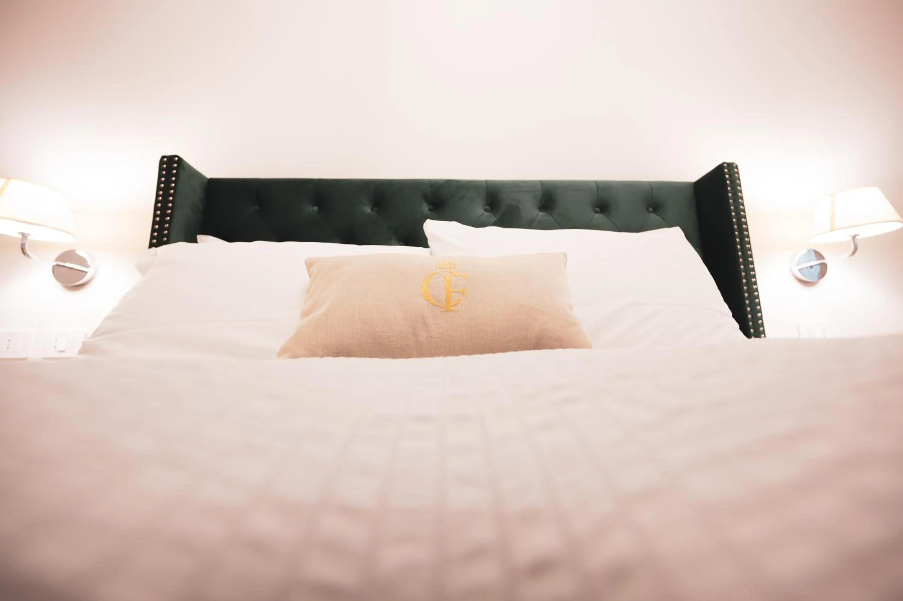 Bed in Carlo Felice Boutique Hotel