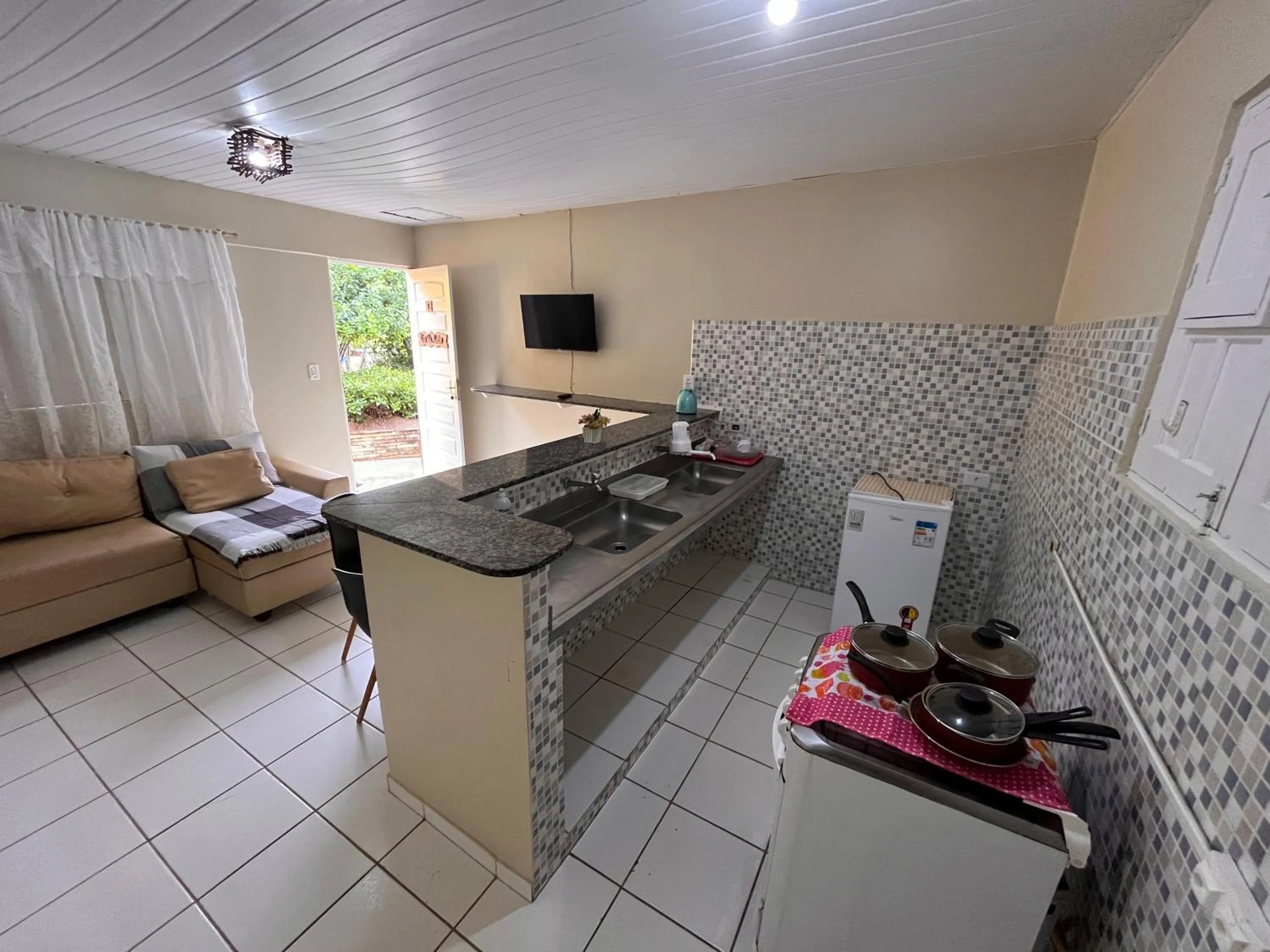 TV and multimedia in Pousada Flor de Merepe