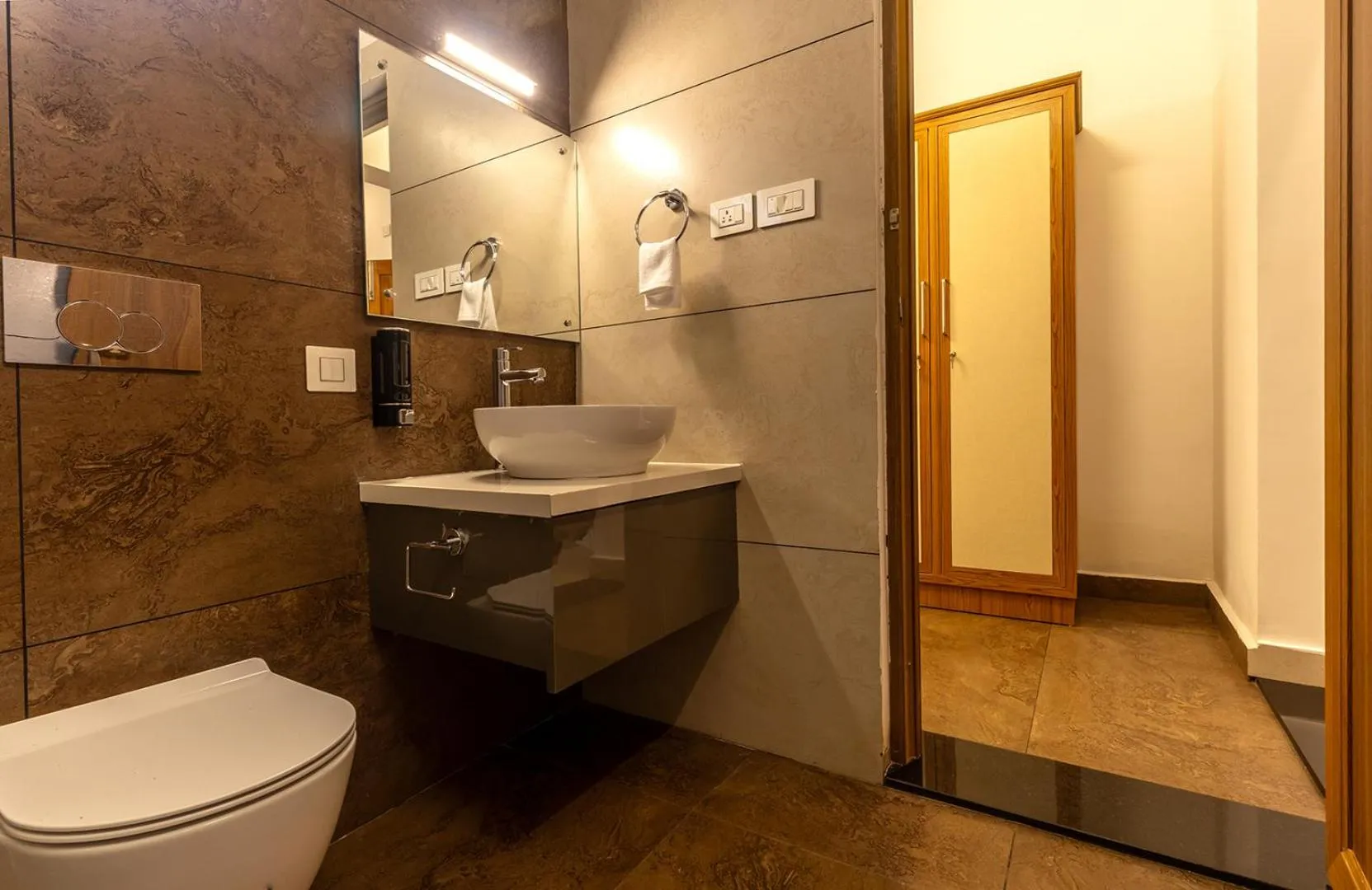 Toilet in SandalMist Resort and Spa