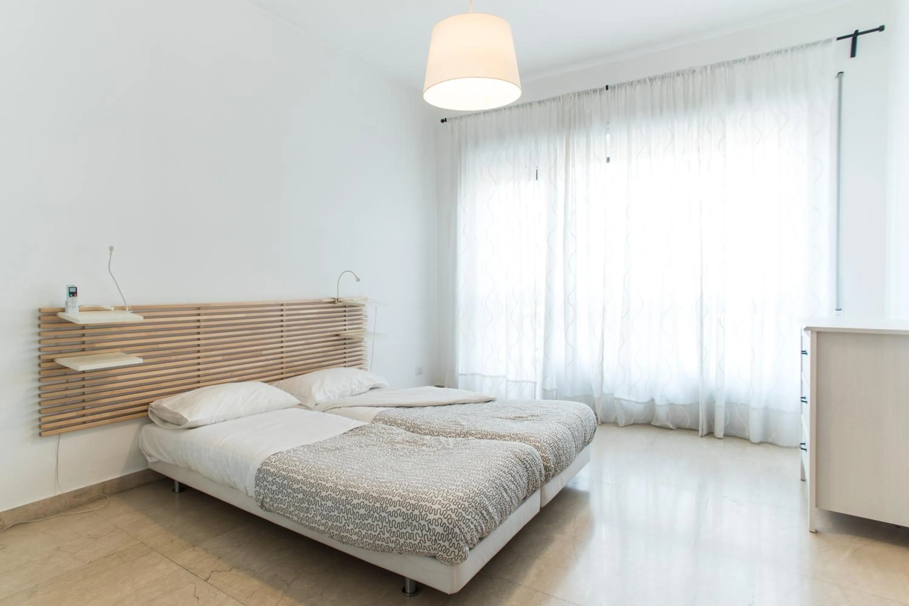 Bed in House in the City