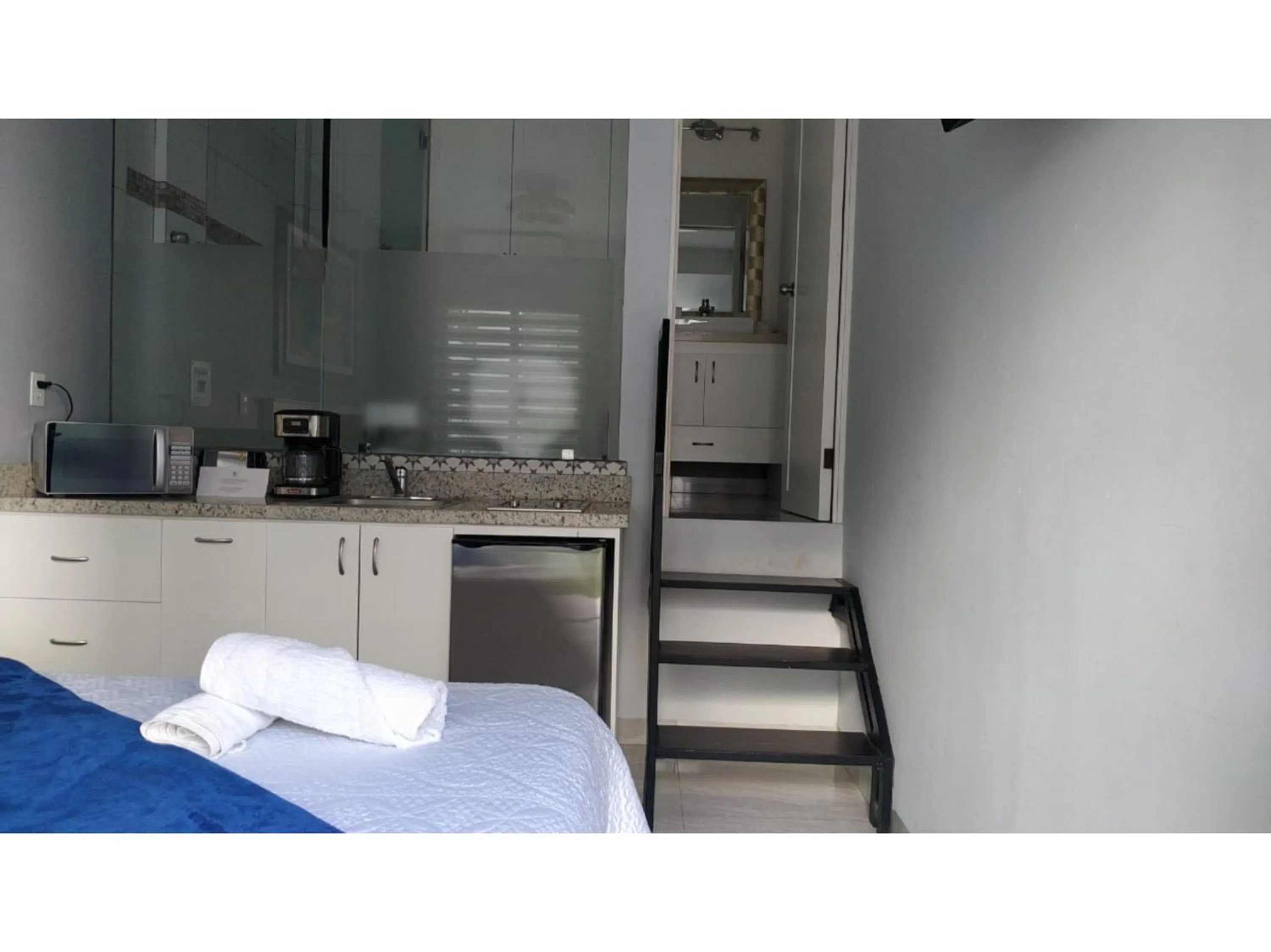 Photo of the whole room, Bed in Collection O Morgan City Center, Los Cabos