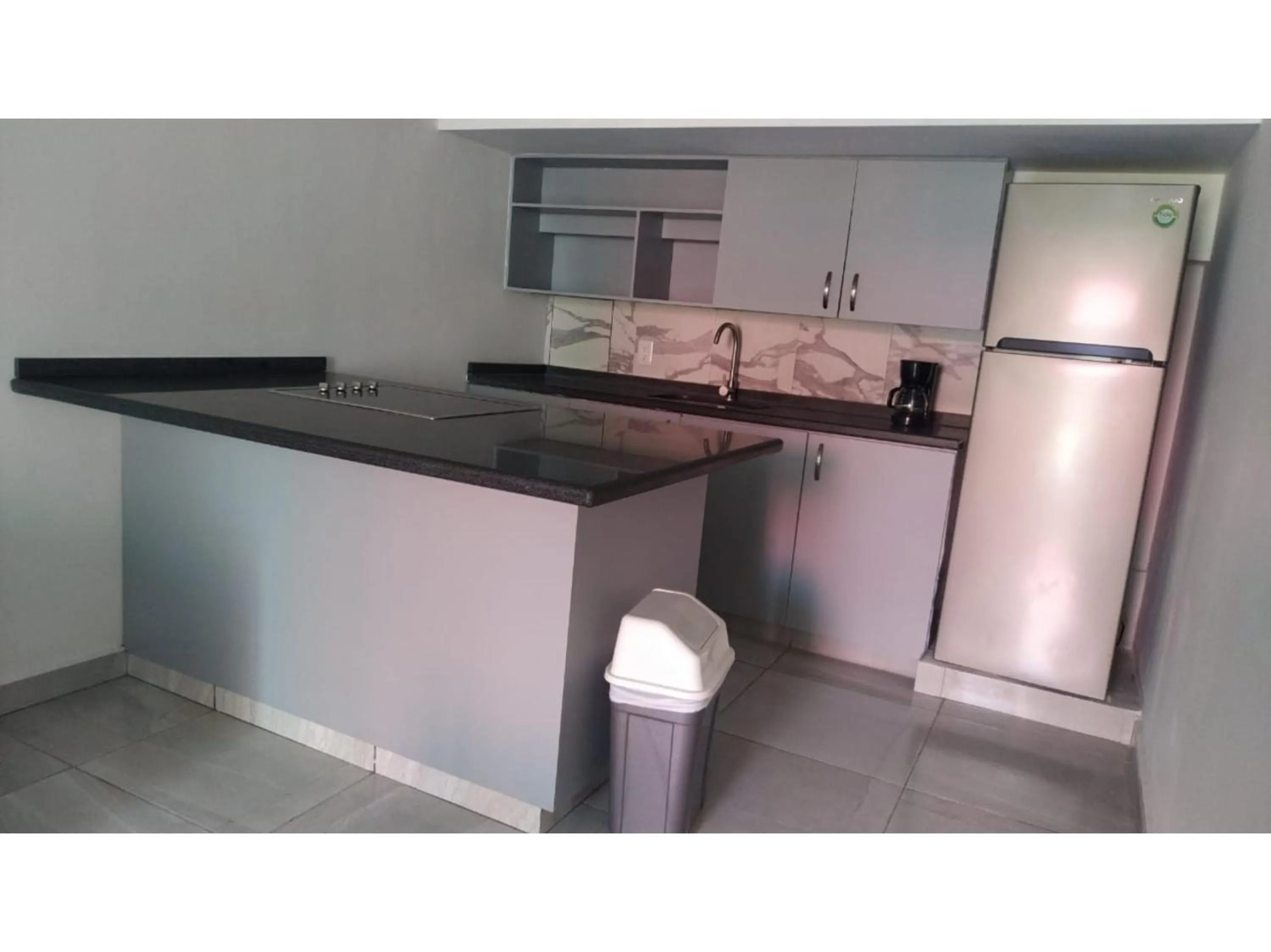 Kitchen or kitchenette in Collection O Morgan City Center, Los Cabos