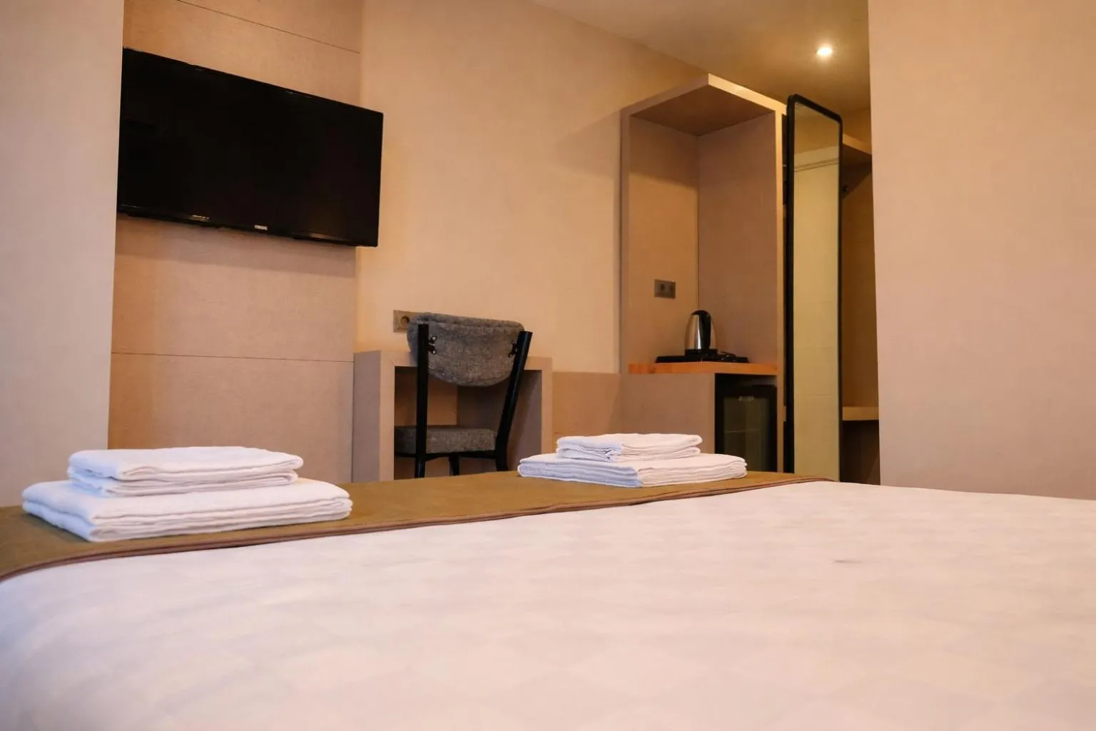 Bed in Bonnie City Hotel