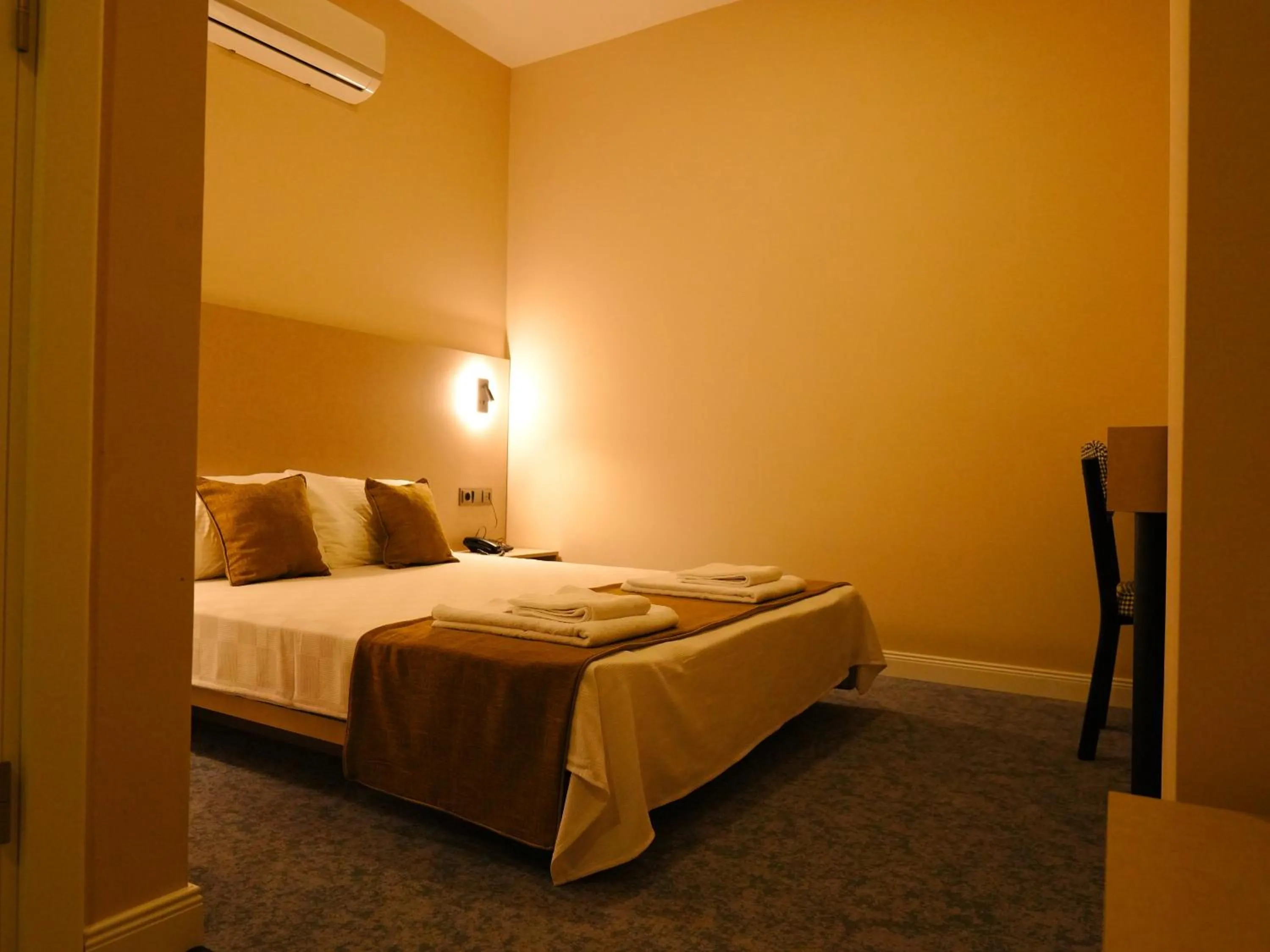 Bed in Bonnie City Hotel