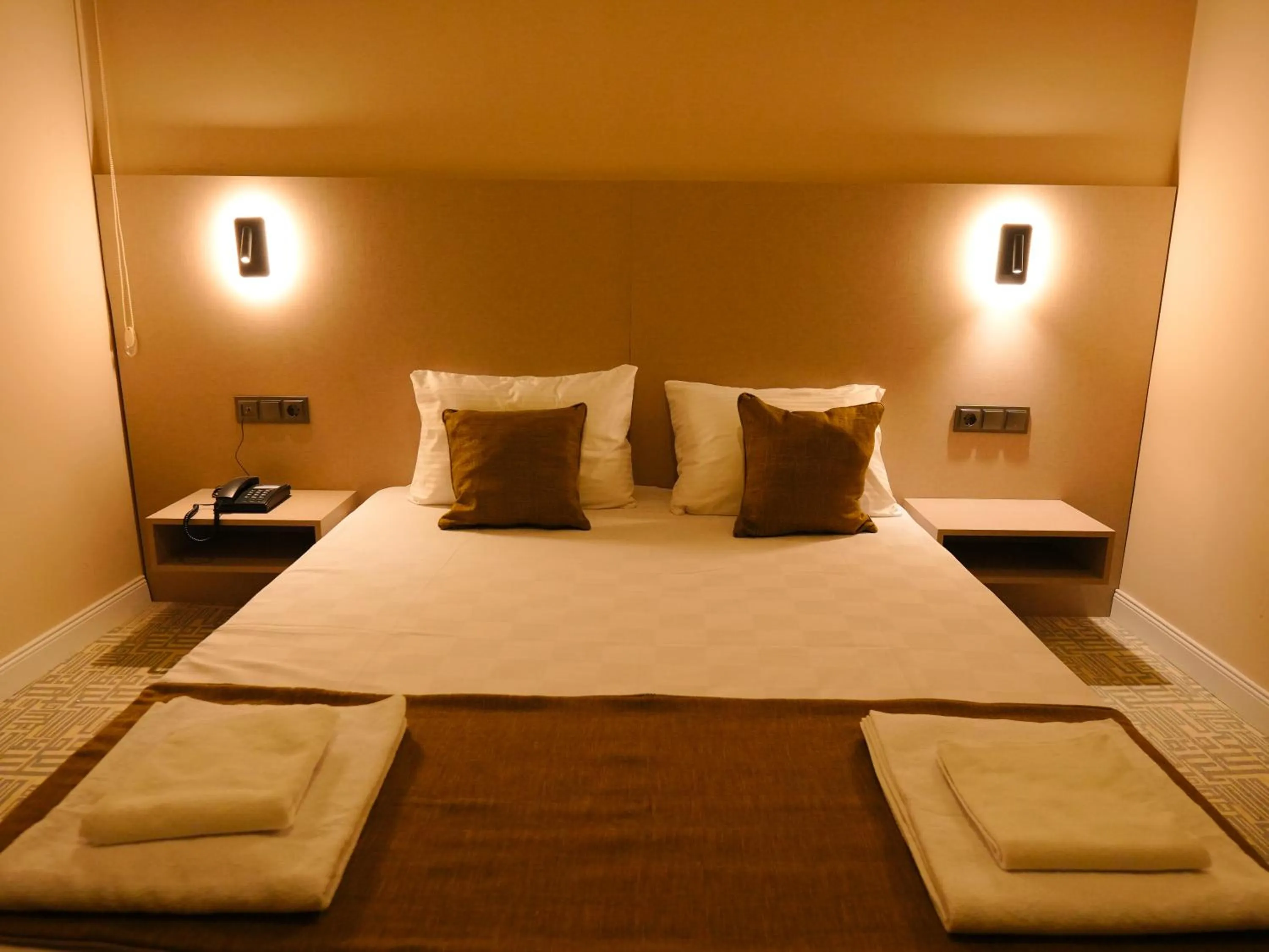 Bed in Bonnie City Hotel