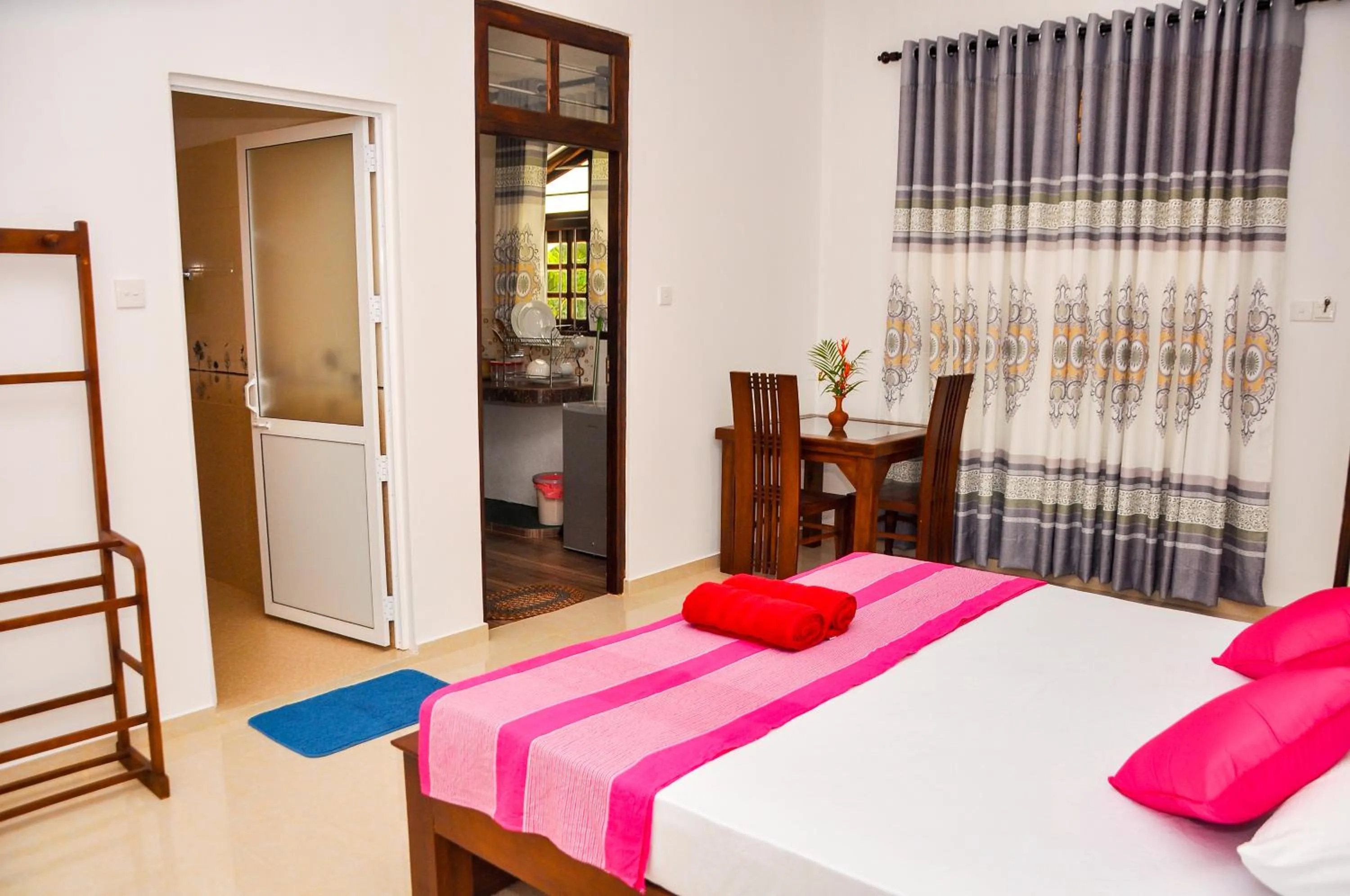 Bed in Hiru Resort Inn