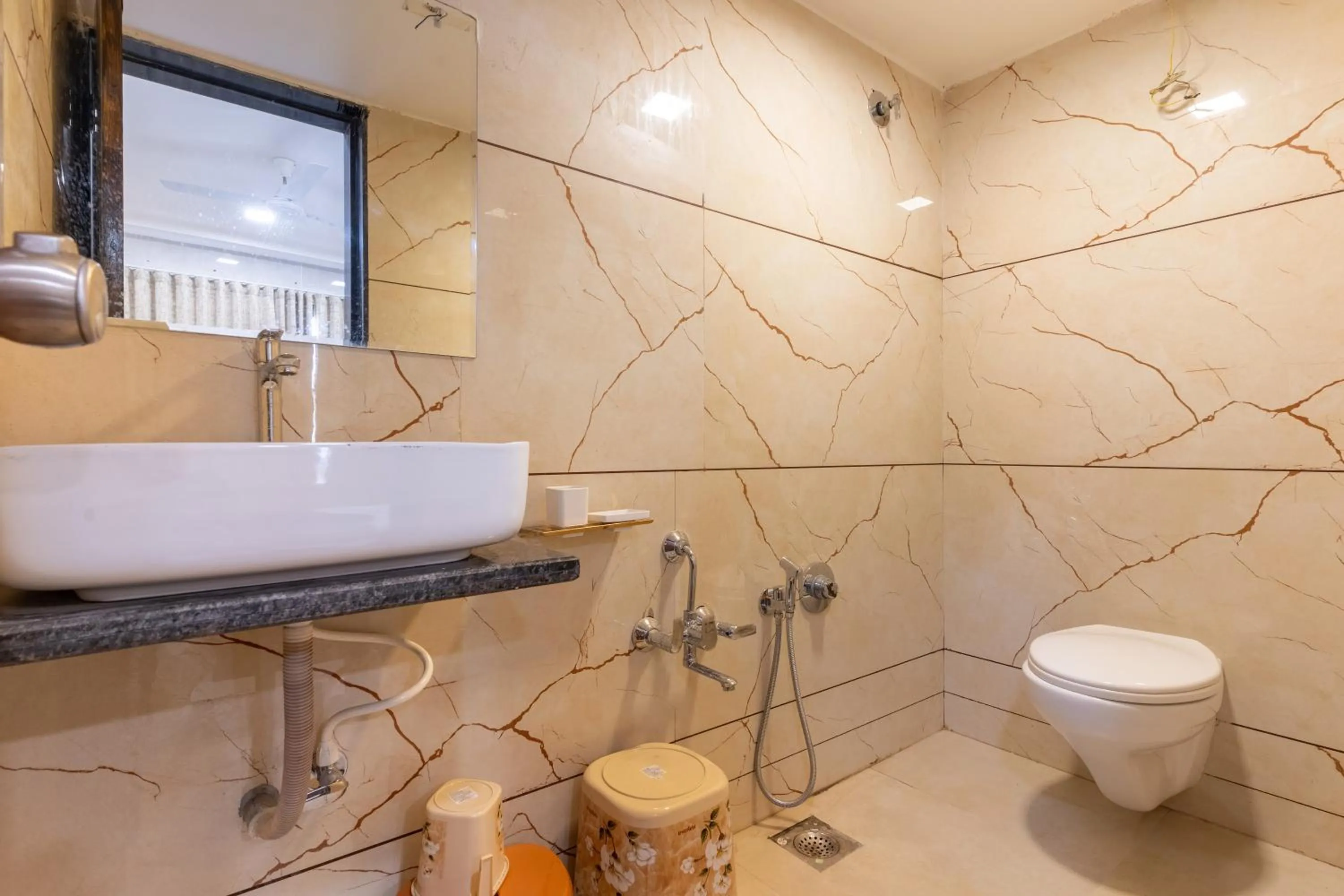 Shower in Hotel Noble Inn, Ahmedabad