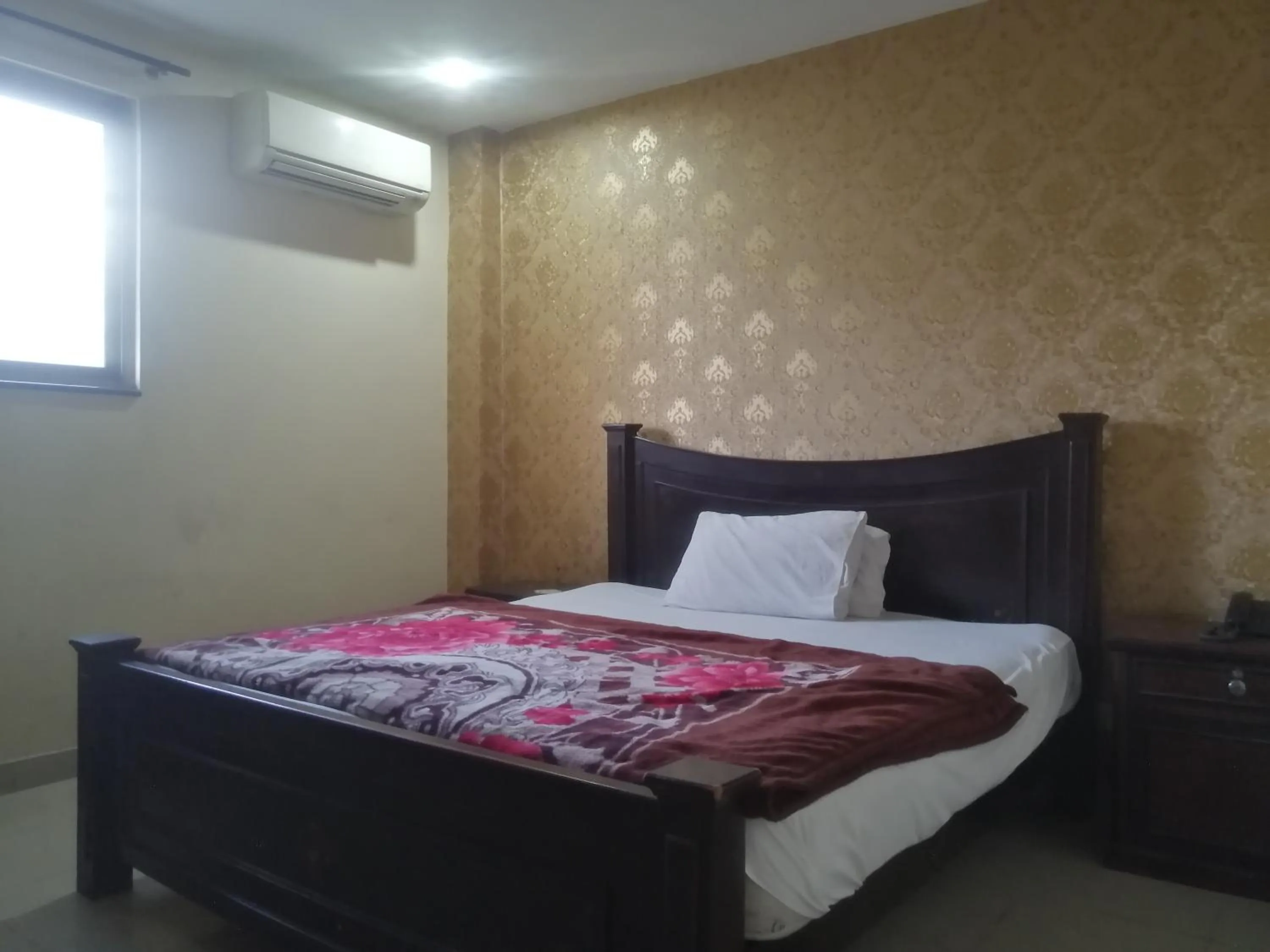 Bed in Fortville Hotel