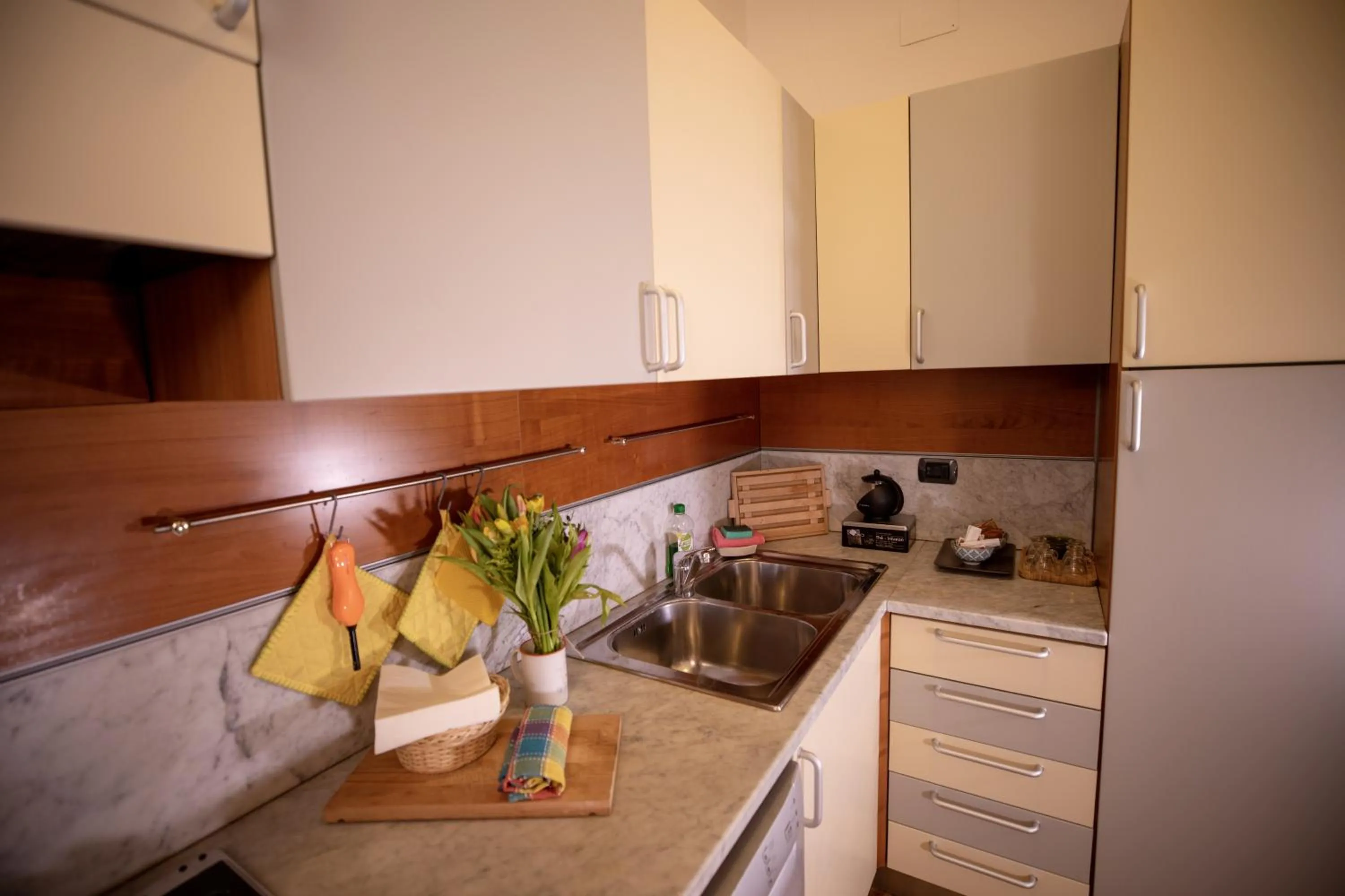 kitchen in Like Romeo Suites