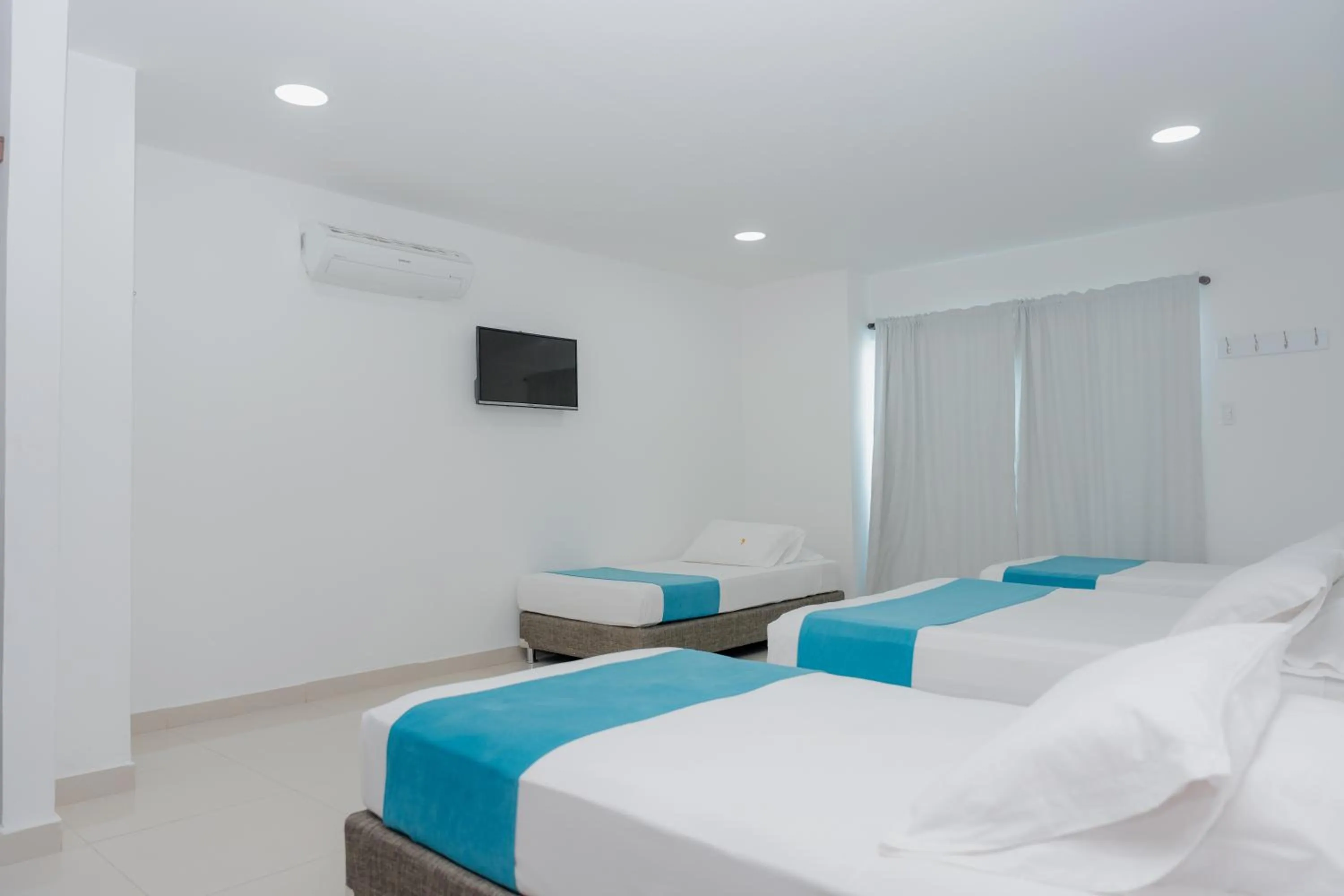 TV and multimedia, Bed in Hotel Aguamarina