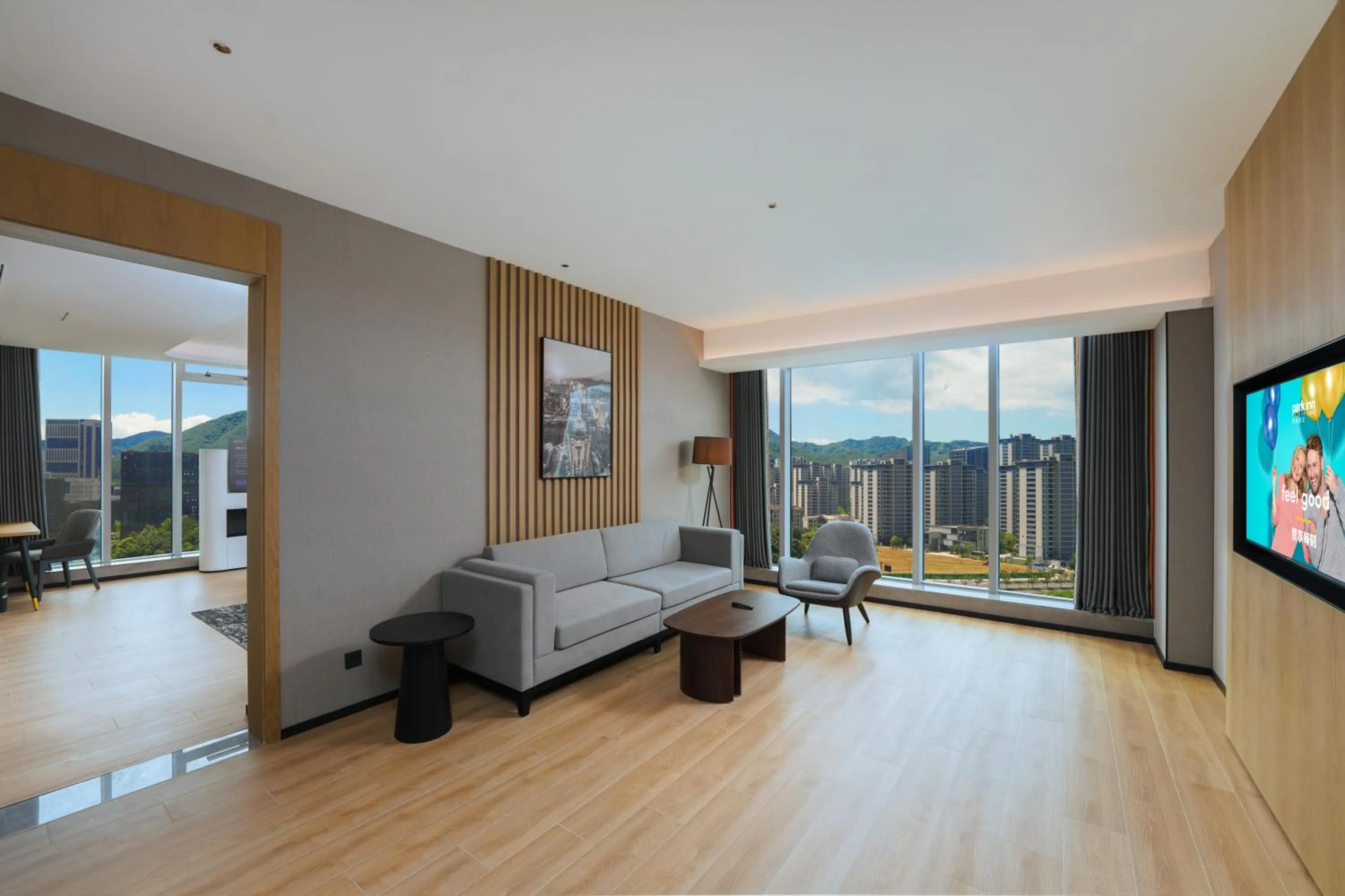 Living room, Bed in Park Inn by Radisson Hangzhou Fuyang Wildlife