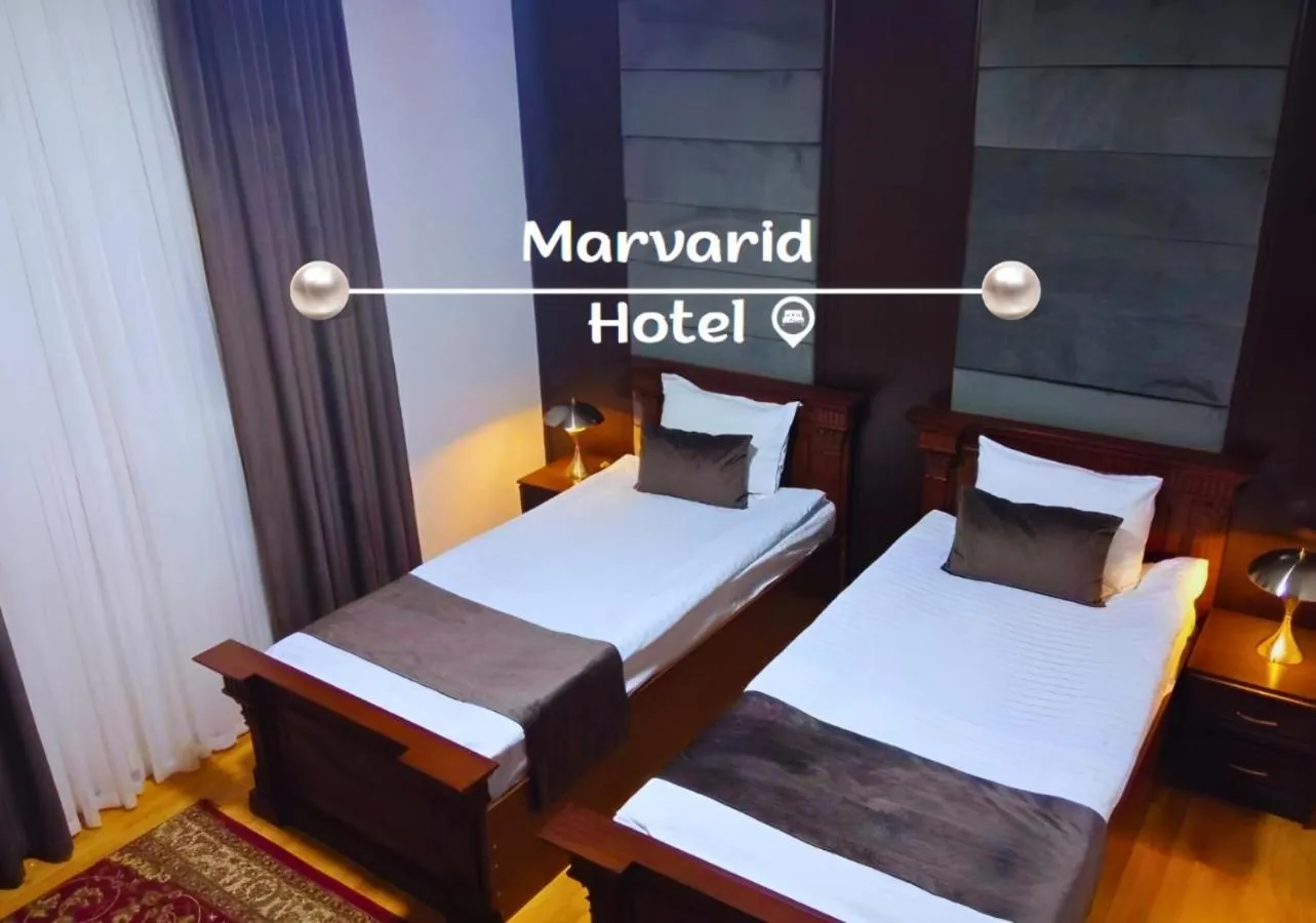 Bed in Marvarid Hotel