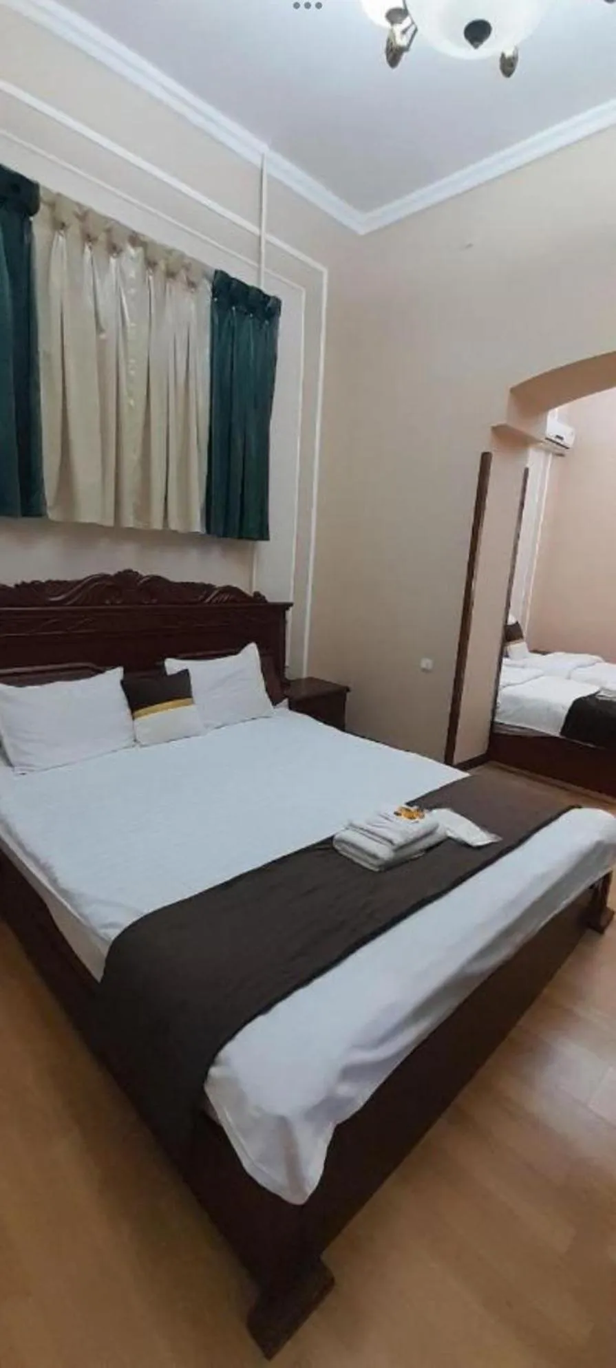 Bed in Marvarid Hotel