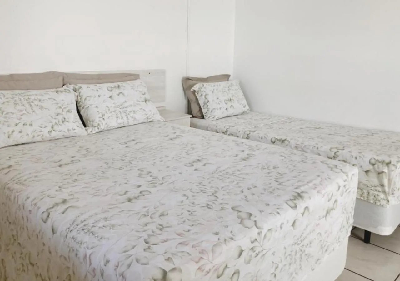 Bed in Pousada Enseada dos Golfinhos