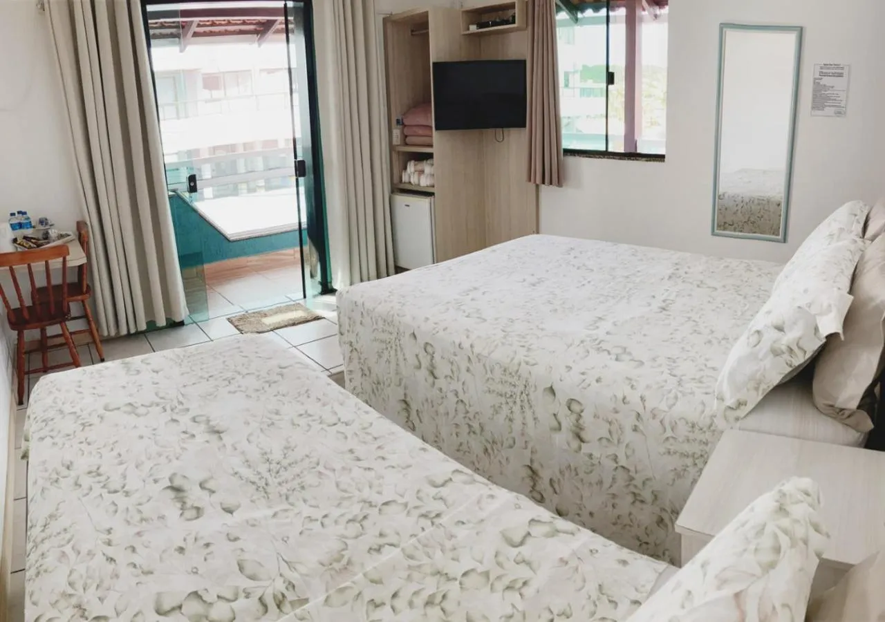 Bed in Pousada Enseada dos Golfinhos