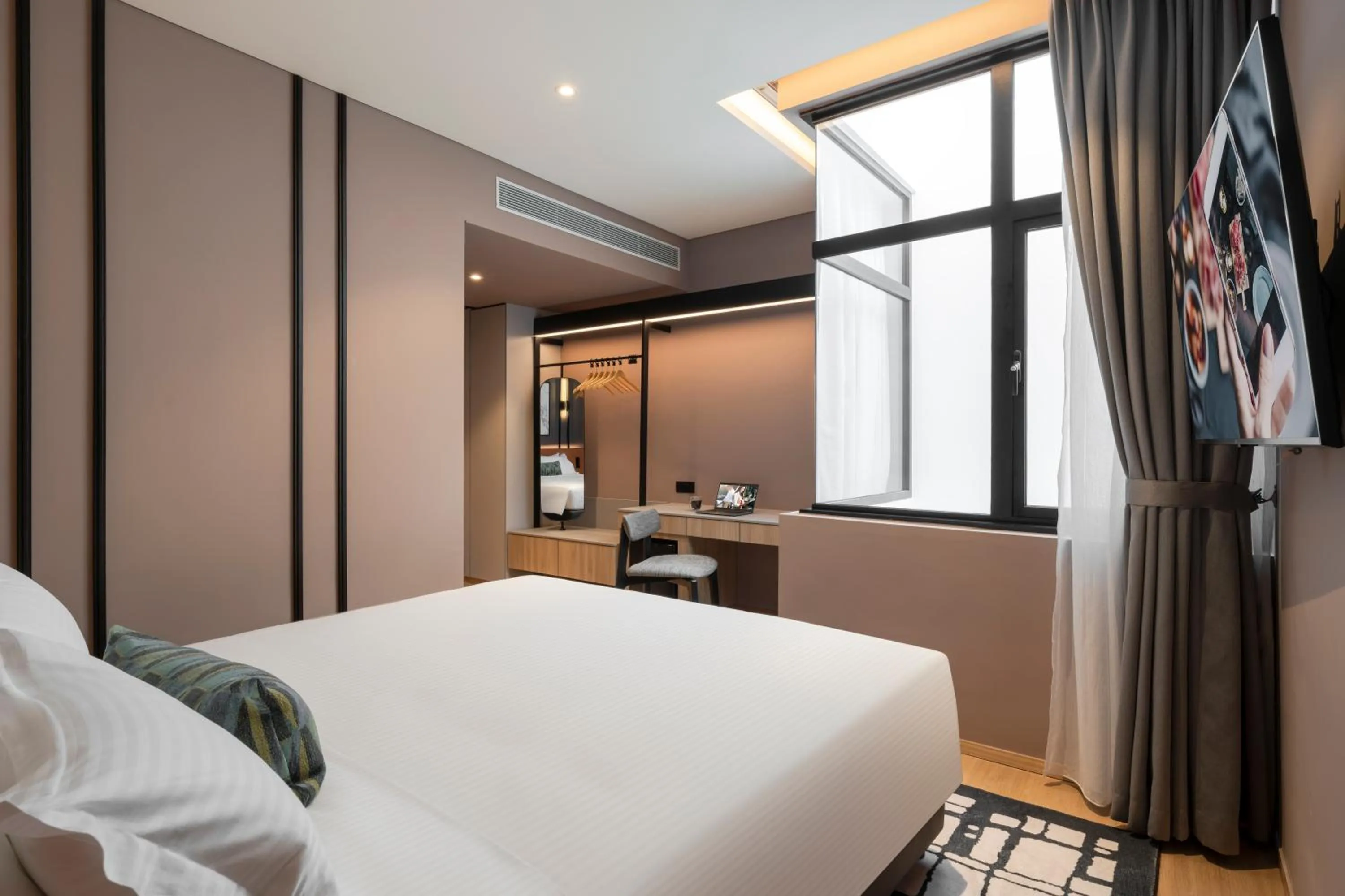 Bed in Citadines Connect Cecil Georgetown Penang