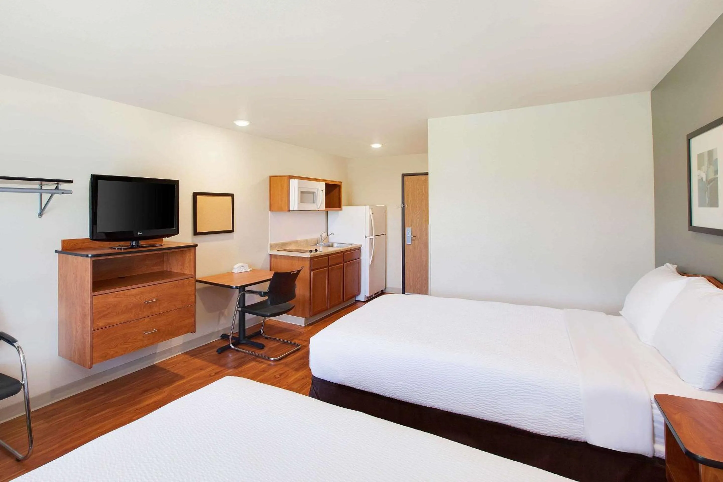 Photo of the whole room, Bed in WoodSpring Suites Lake Charles