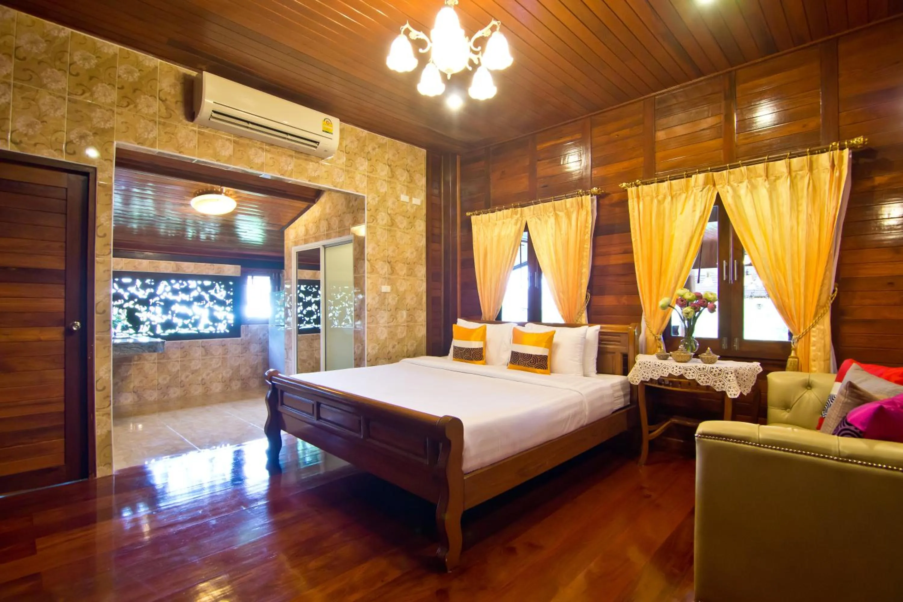 Photo of the whole room, Bed in Bueng Bua Thong Resort