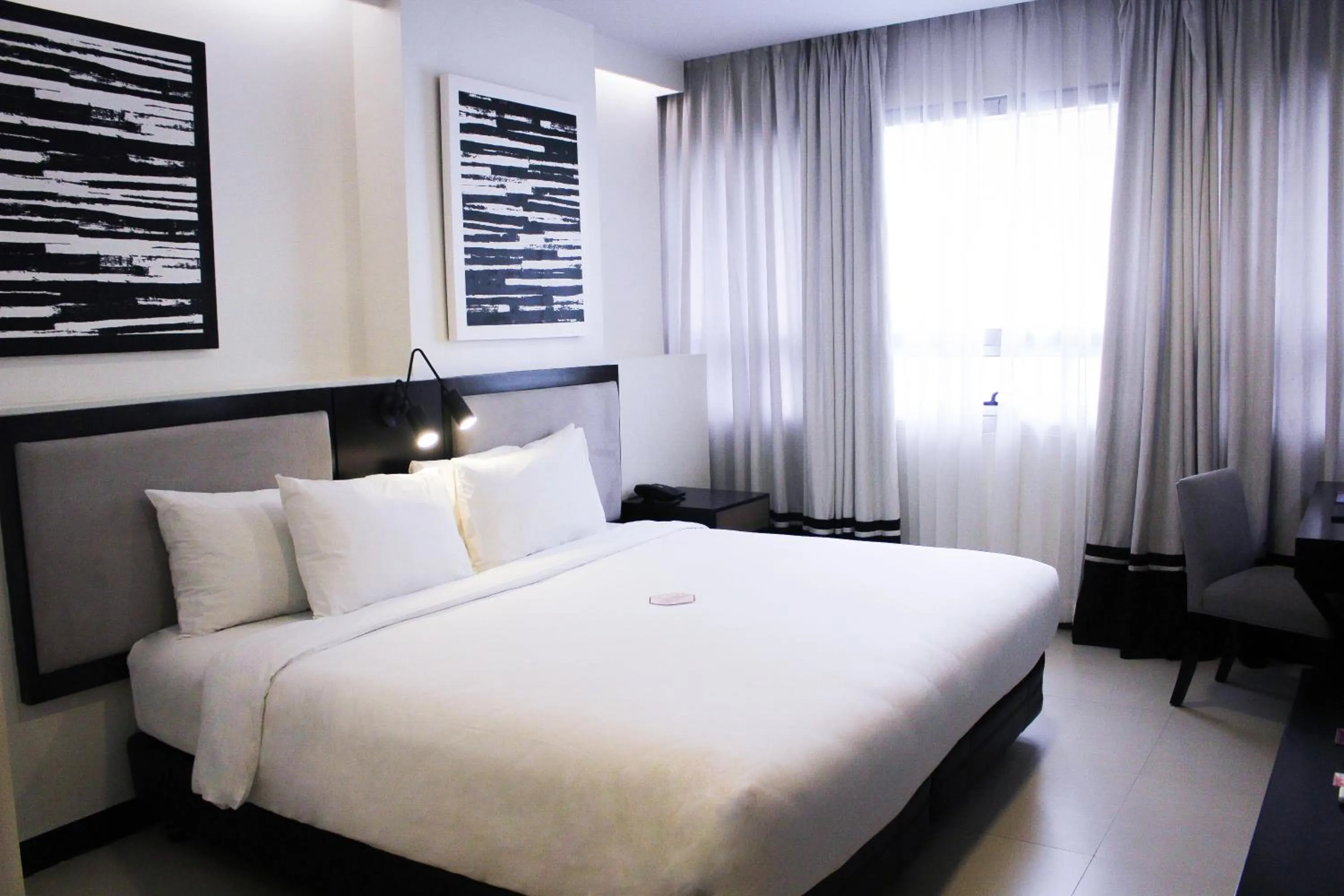 Bed in Summit Hotel Magnolia