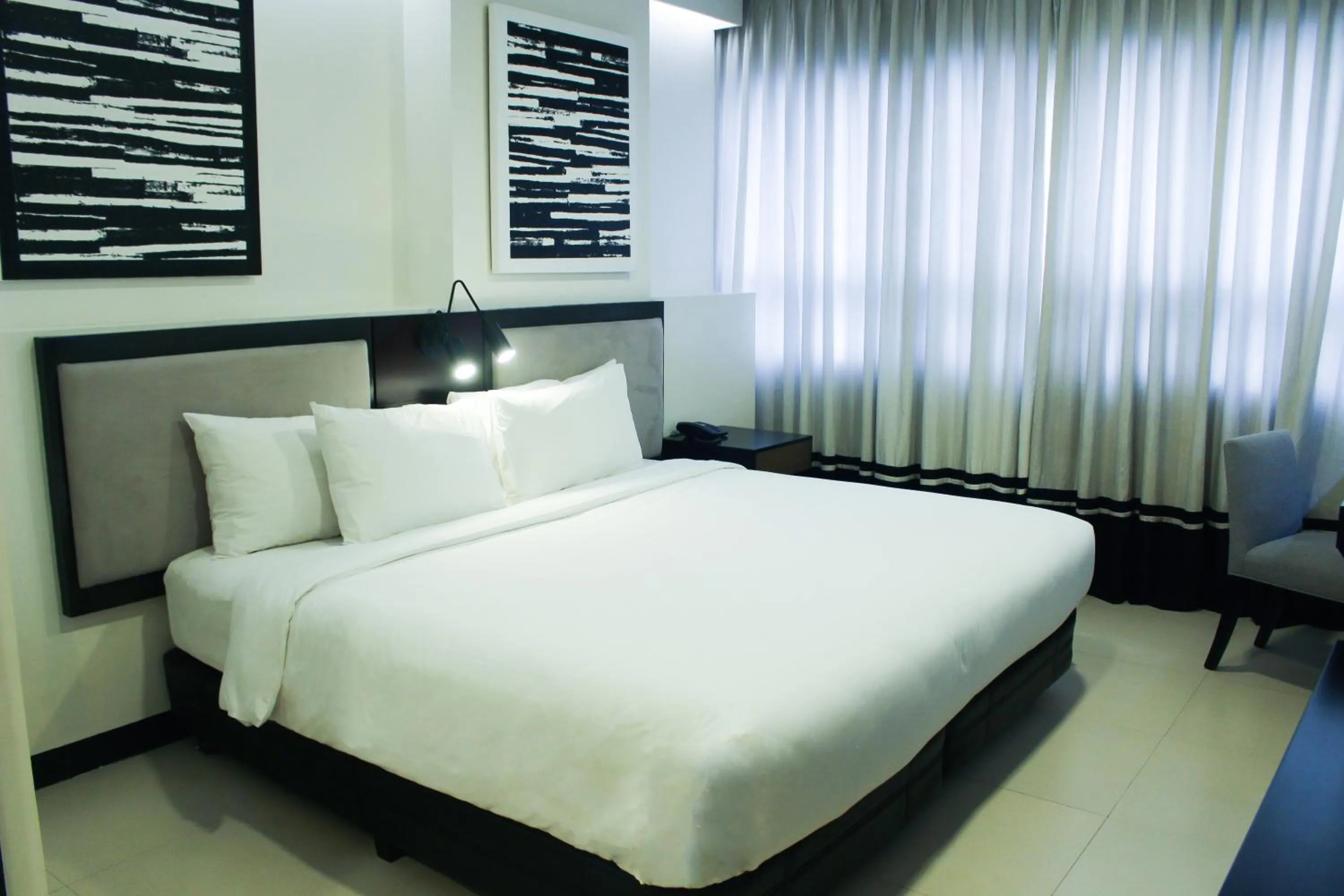 Bed in Summit Hotel Magnolia