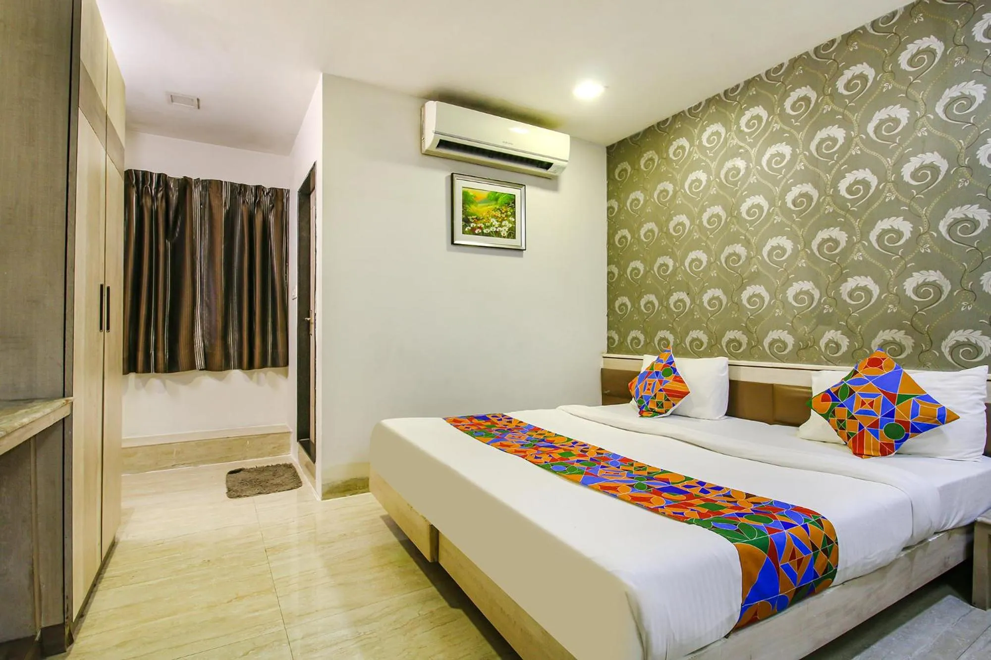 Bed in FabHotel Smriti Star