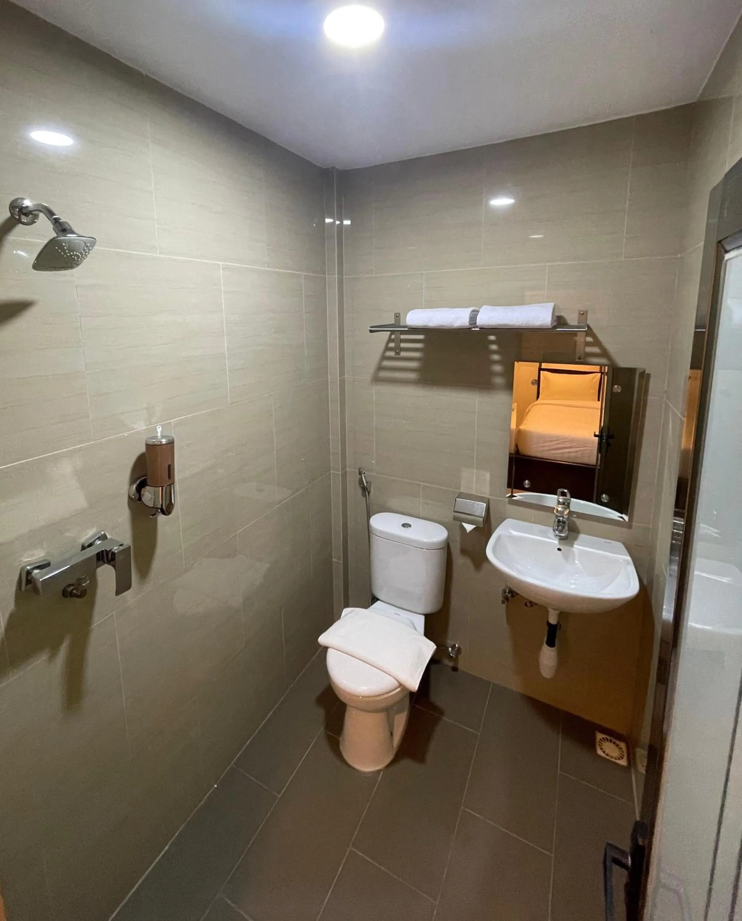 Deluxe Room (2 Adults + 1 Child) in Urbanview Hotel X Ten Harbour Bay Batam