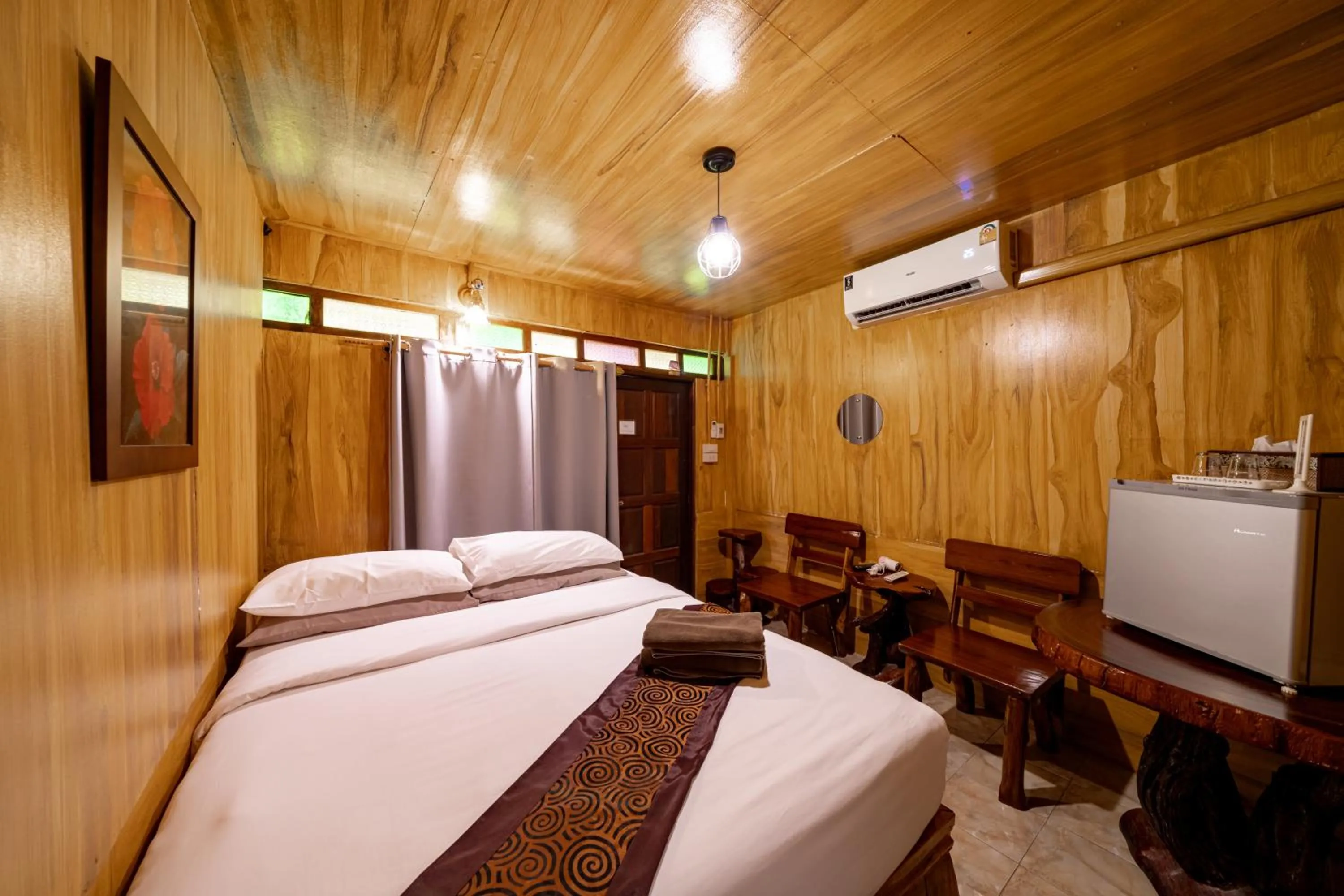 Bed in Athithara Homestay