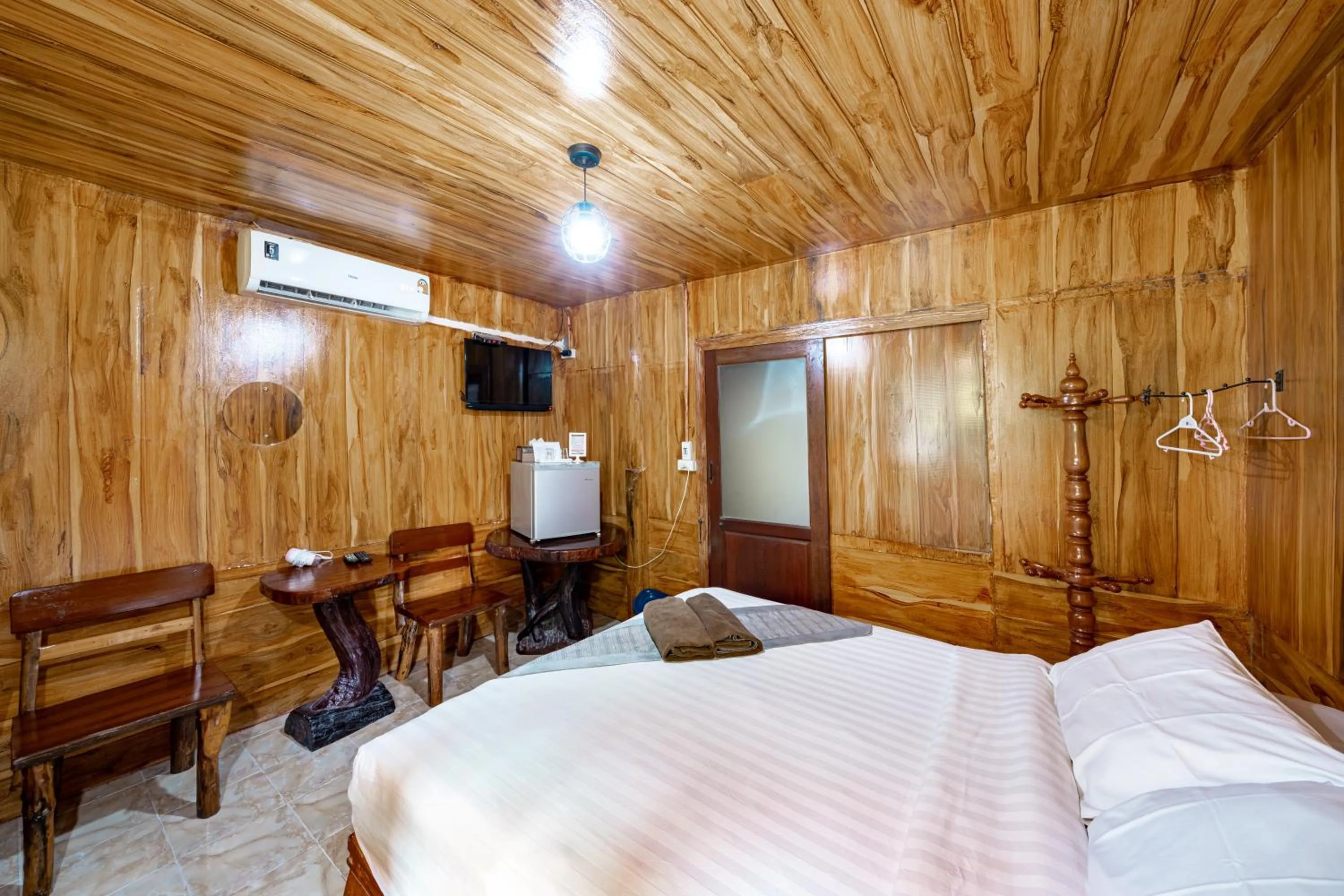 Bed in Athithara Homestay