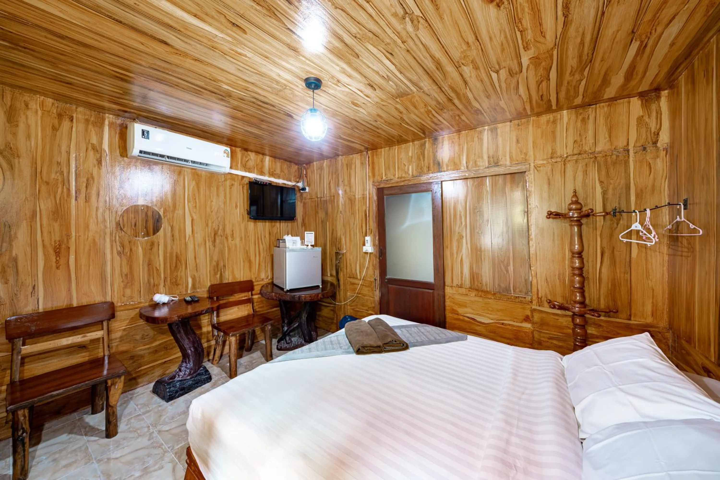 Bed in Athithara Homestay