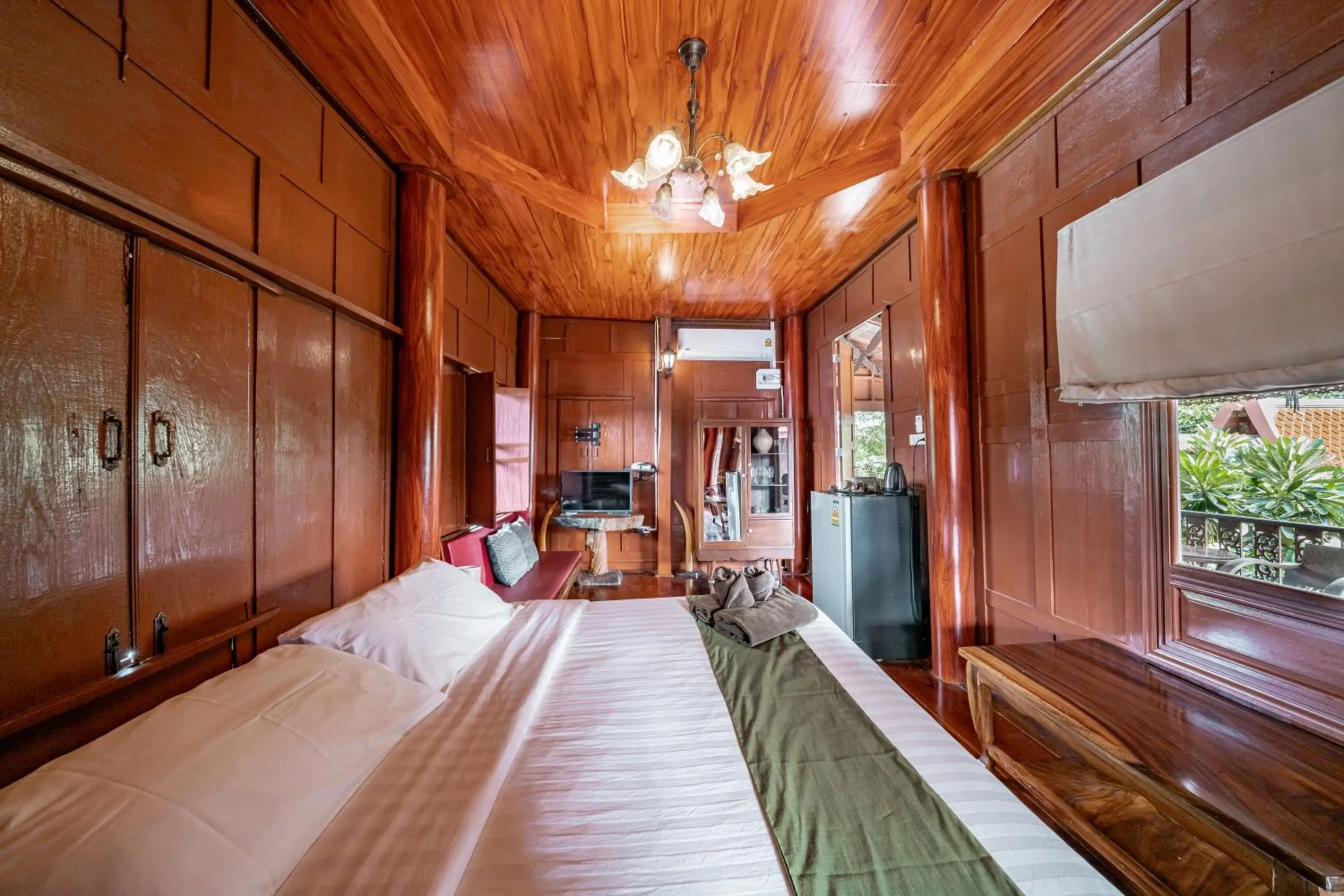 Bed in Athithara Homestay