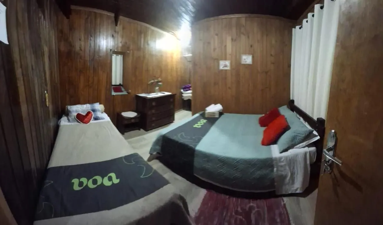 Bedroom in Chalé das Neves